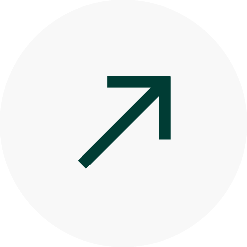 Black arrow pointing diagonally upward to the right on a white circular background.