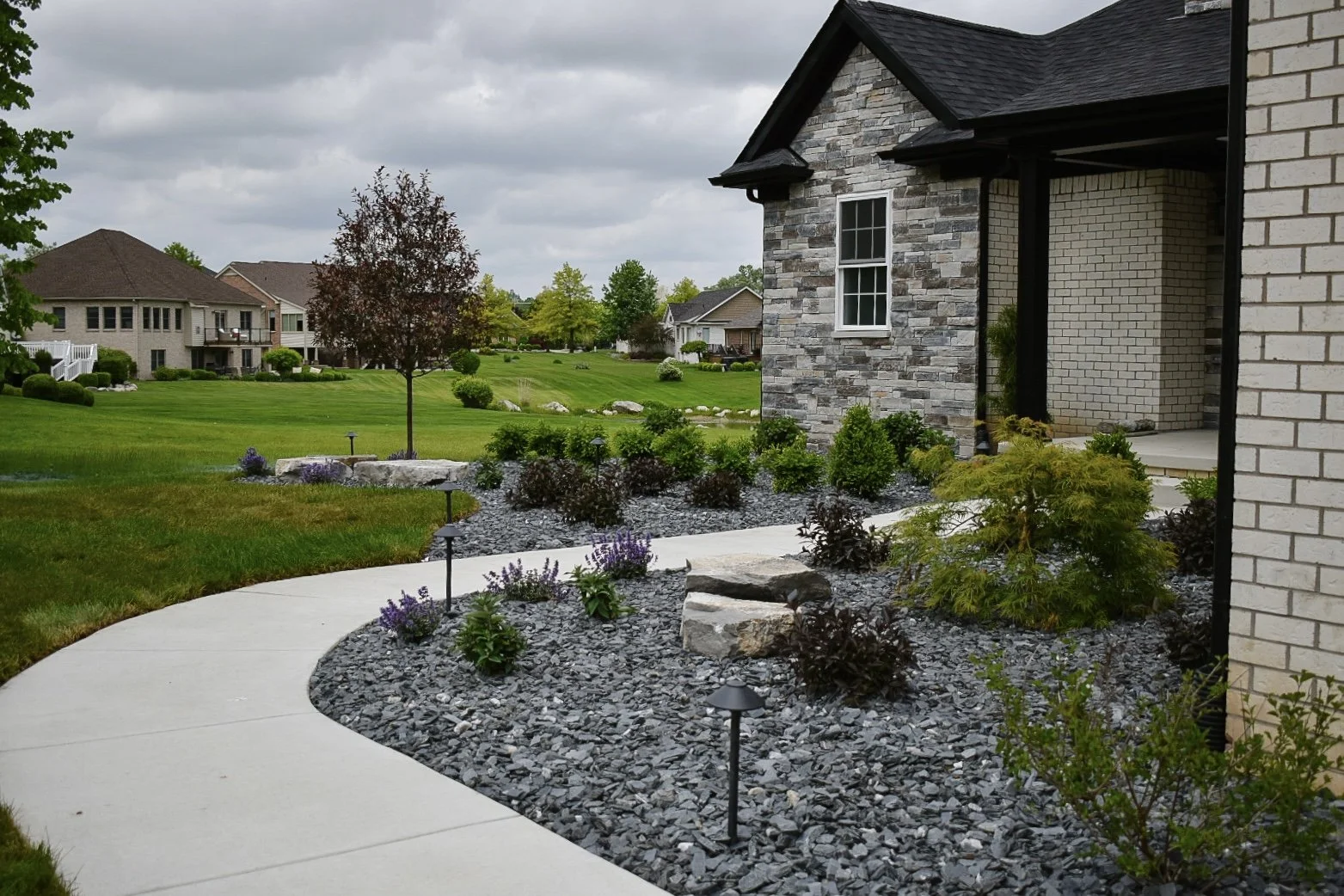Landscaping consultation meeting with homeowner in Flat Rock MI