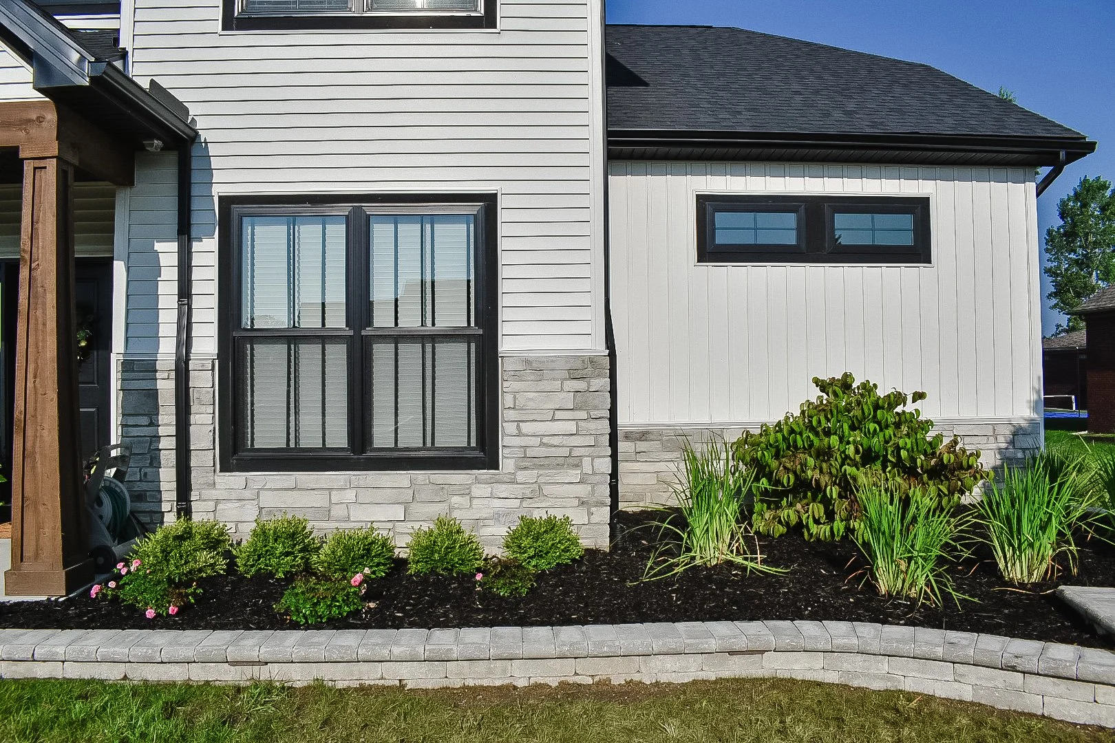 Retaining wall with landscape integration in Southeast Michigan yard