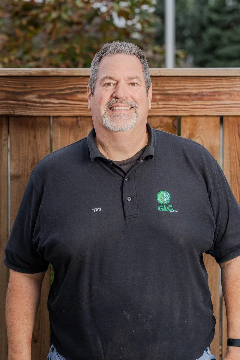 Tim, Project Operations Manager, in a black GLC polo — GLC Landscaping & Pools
