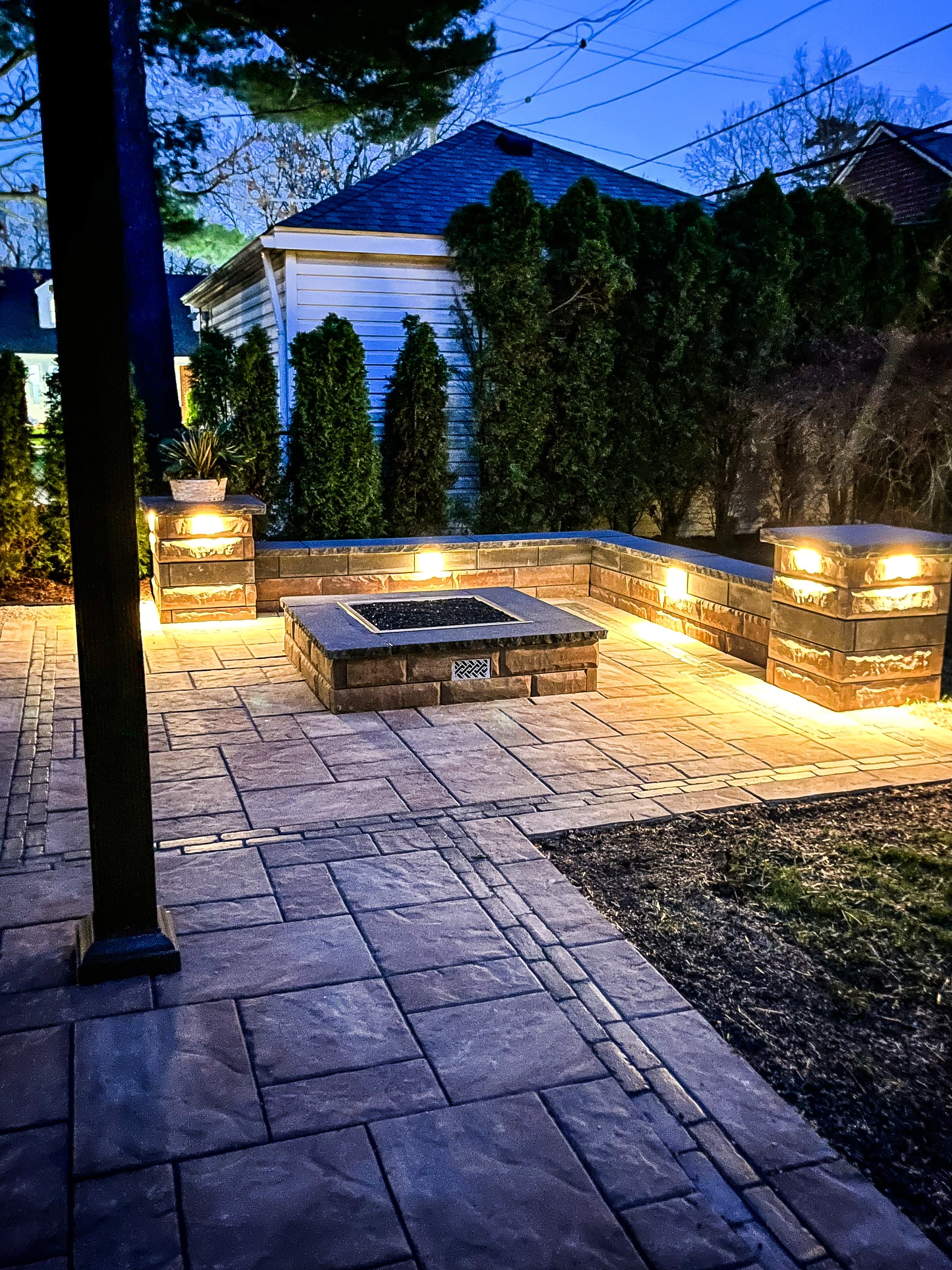 Pathway lights leading to backyard patio — GLC Lawn & Landscape