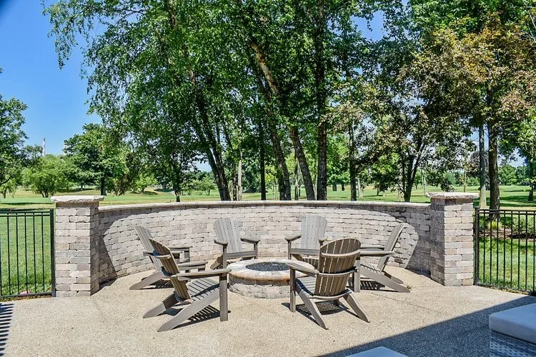 Retaining wall and seating wall construction improving outdoor living space in Woodhaven, MI