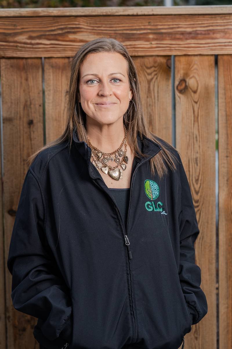 Kristen, Accounting Specialist, in a black GLC jacket — GLC Landscaping & Pools