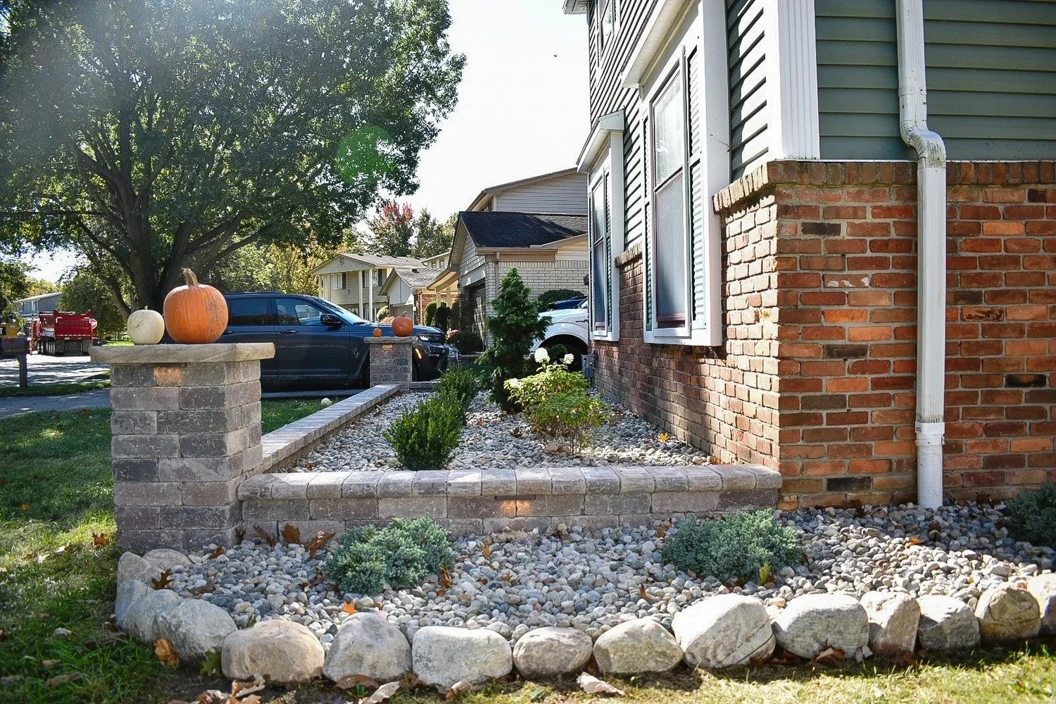 Seating wall with integrated steps in Grosse Ile MI backyard