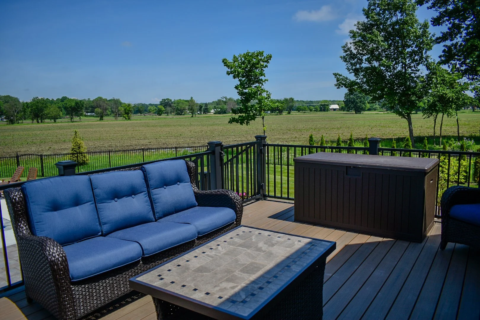 Raised water feature wall and integrated spa installation creating a luxury backyard resort experience — GLC Lawn & Landscape