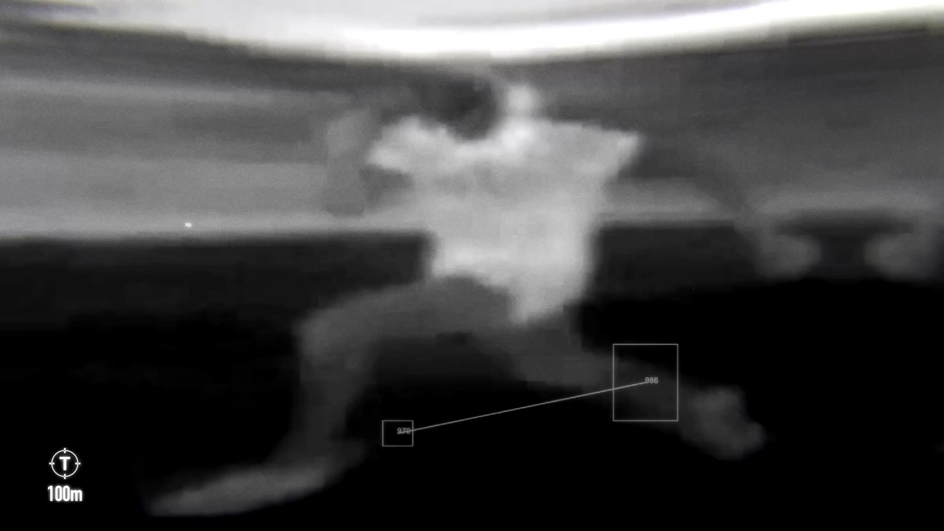 Black and white infrared image of a cloud of smoke or vapor with remote sensing overlay, including measurement markers and a scale indicating 100 meters.