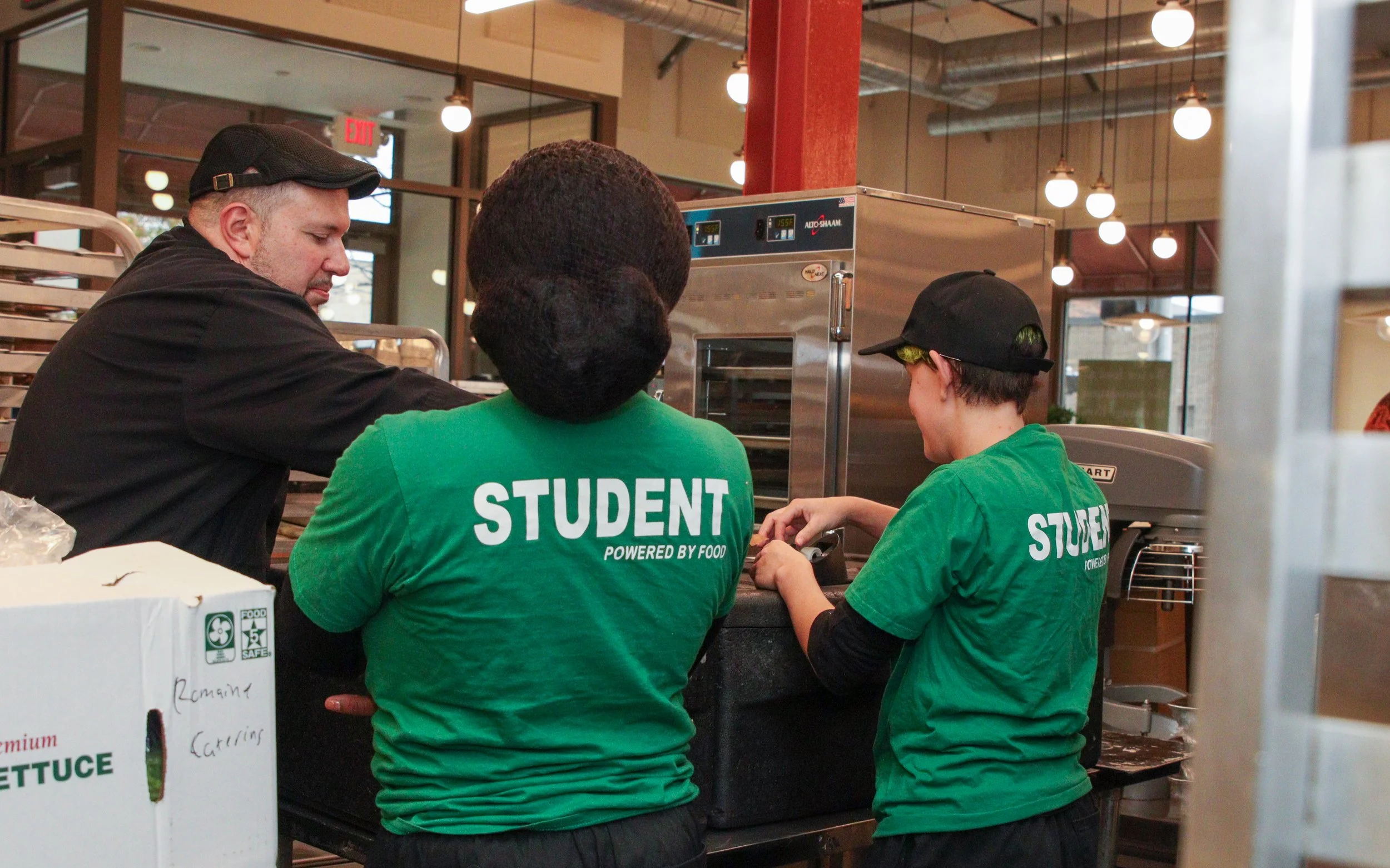 Teaching Students how to properly package a catering for shipment