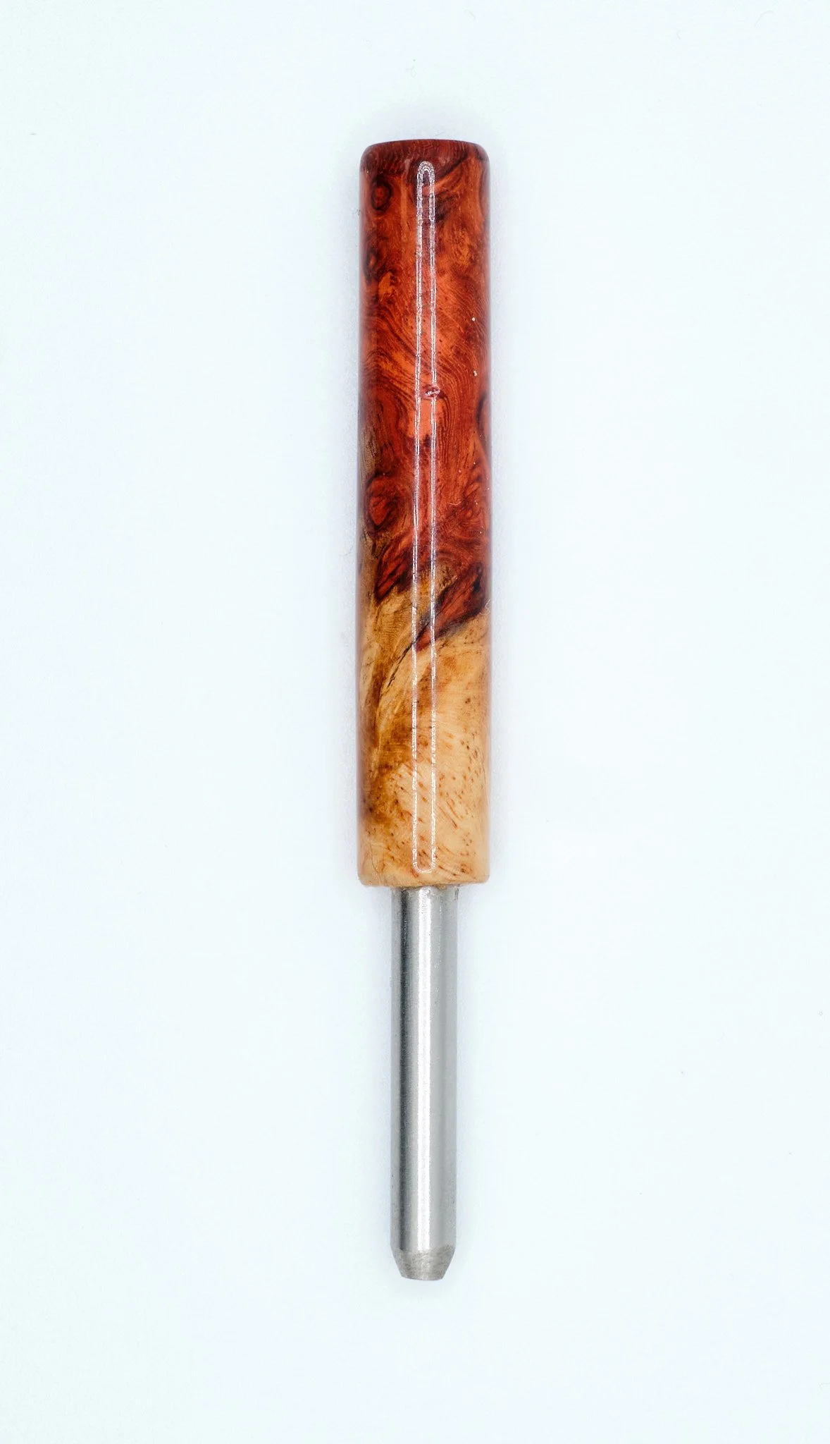Wood handle with a metal tip on a white background.