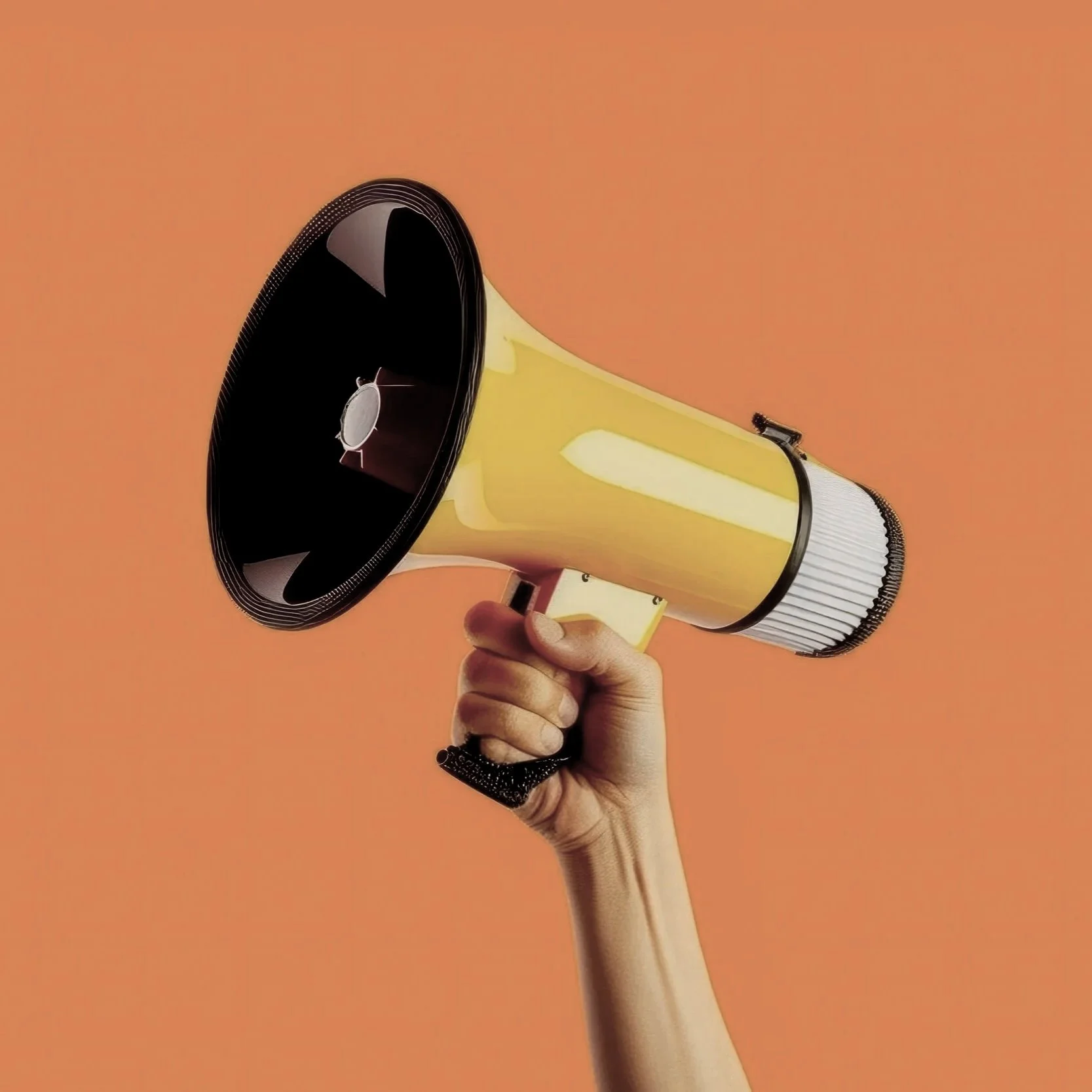 A human hand holding a megaphone against a plain orange background.