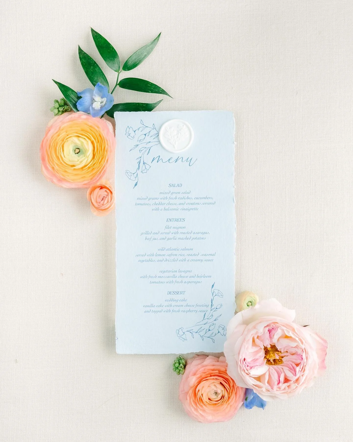 Menus as memorable as the meal 🩵
.
.
.
.
.
#weddingmenu 
#receptionmenu #weddingtable #weddingtablesetting #weddingtablemenu #tablemenu #dustybluewedding 
#bluewedding #handmadepaper #deckleedgepaper 
#weddingreception #weddingstationer 
#weddingsta