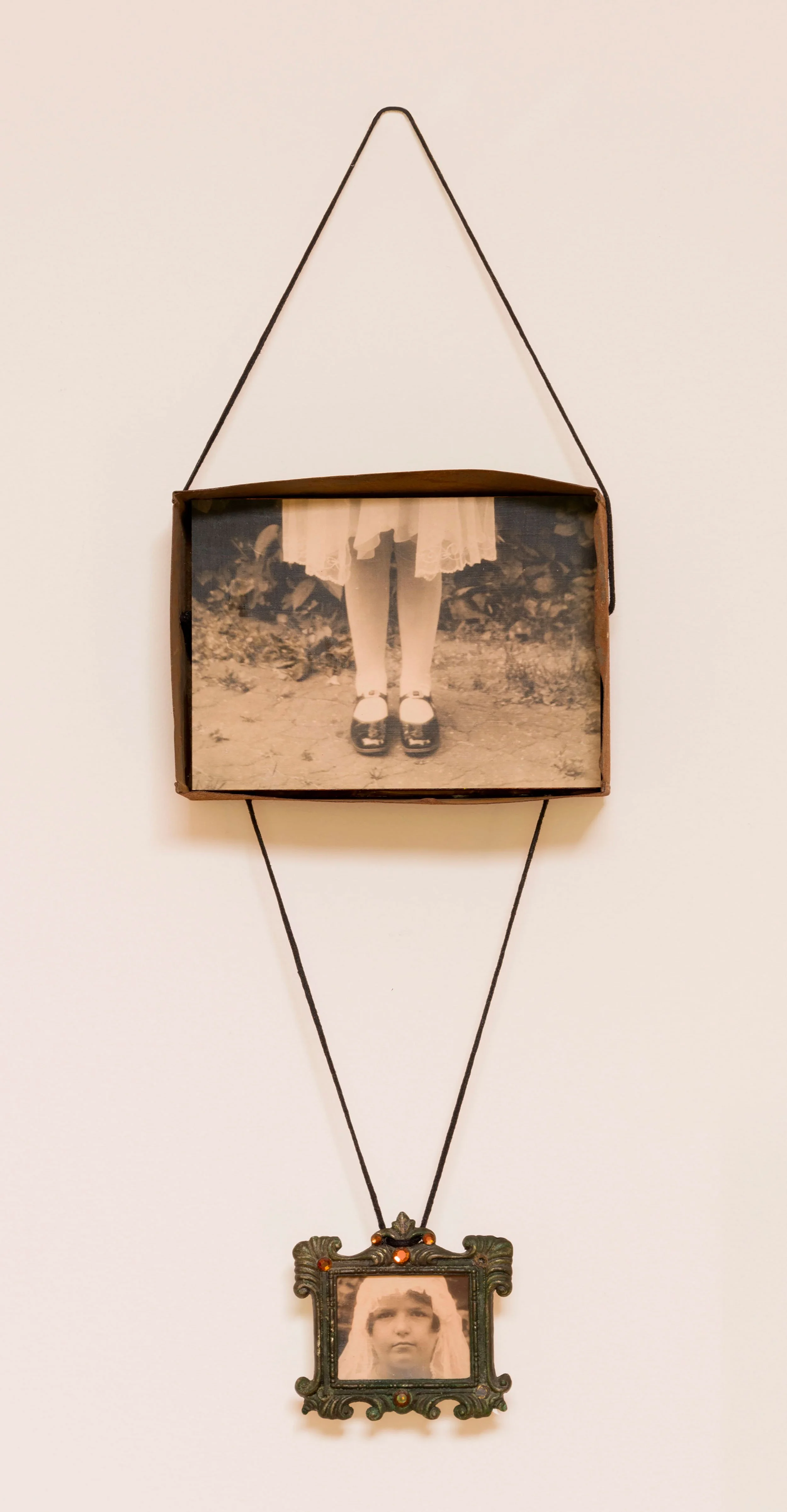 Beneath Her Feet - vintage: tin box, frame, family photograph, waxed cotton cording 
9.5 x 4.5 x 1.5 inches