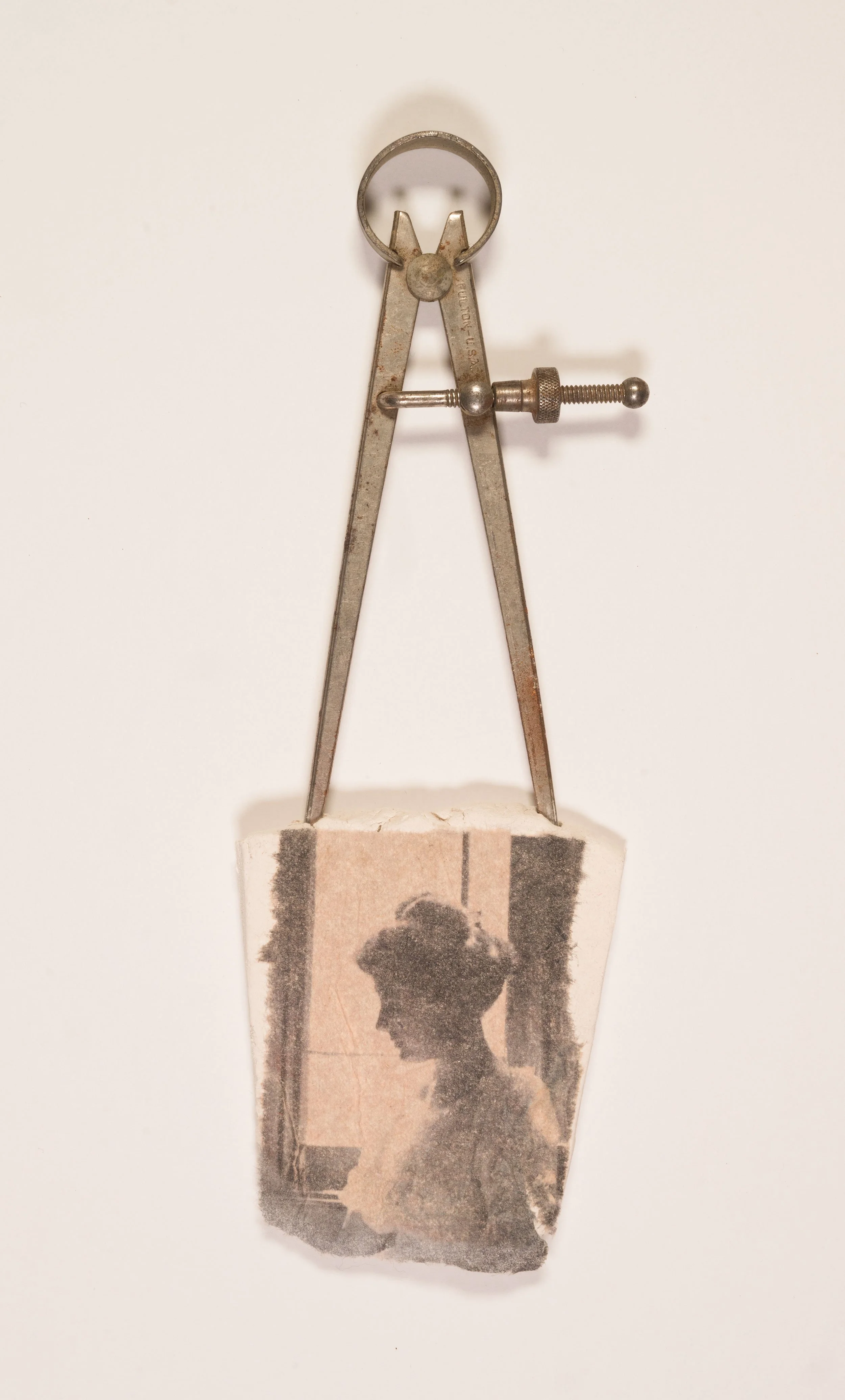Dimensions of Solitude - vintage caliper, paper clay, vintage family photograph 
7.75 x 2.75 inches