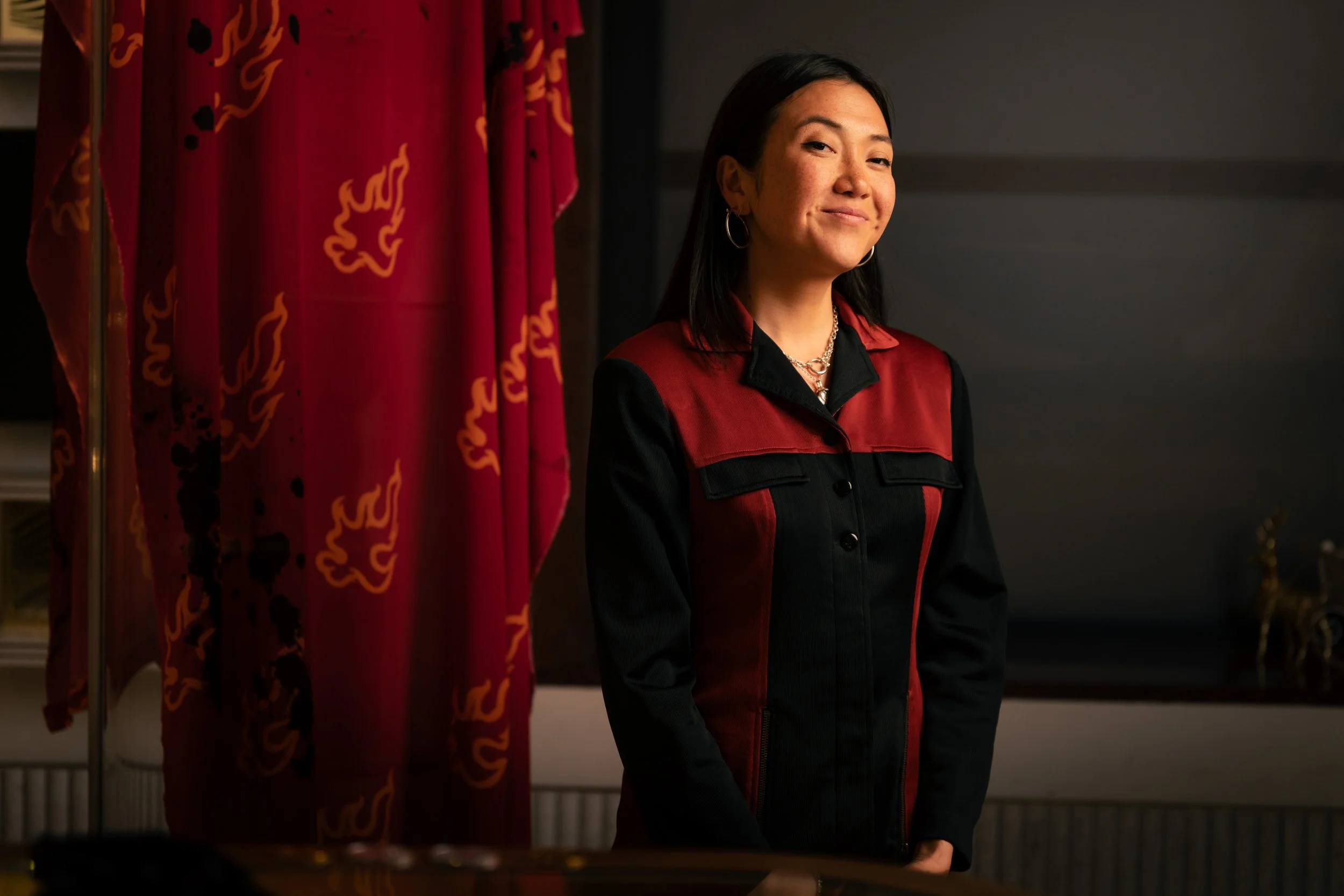 Rainbow Chan installing "The Fire Horse" display in ABC Bullion's flagship store in Martin Place.