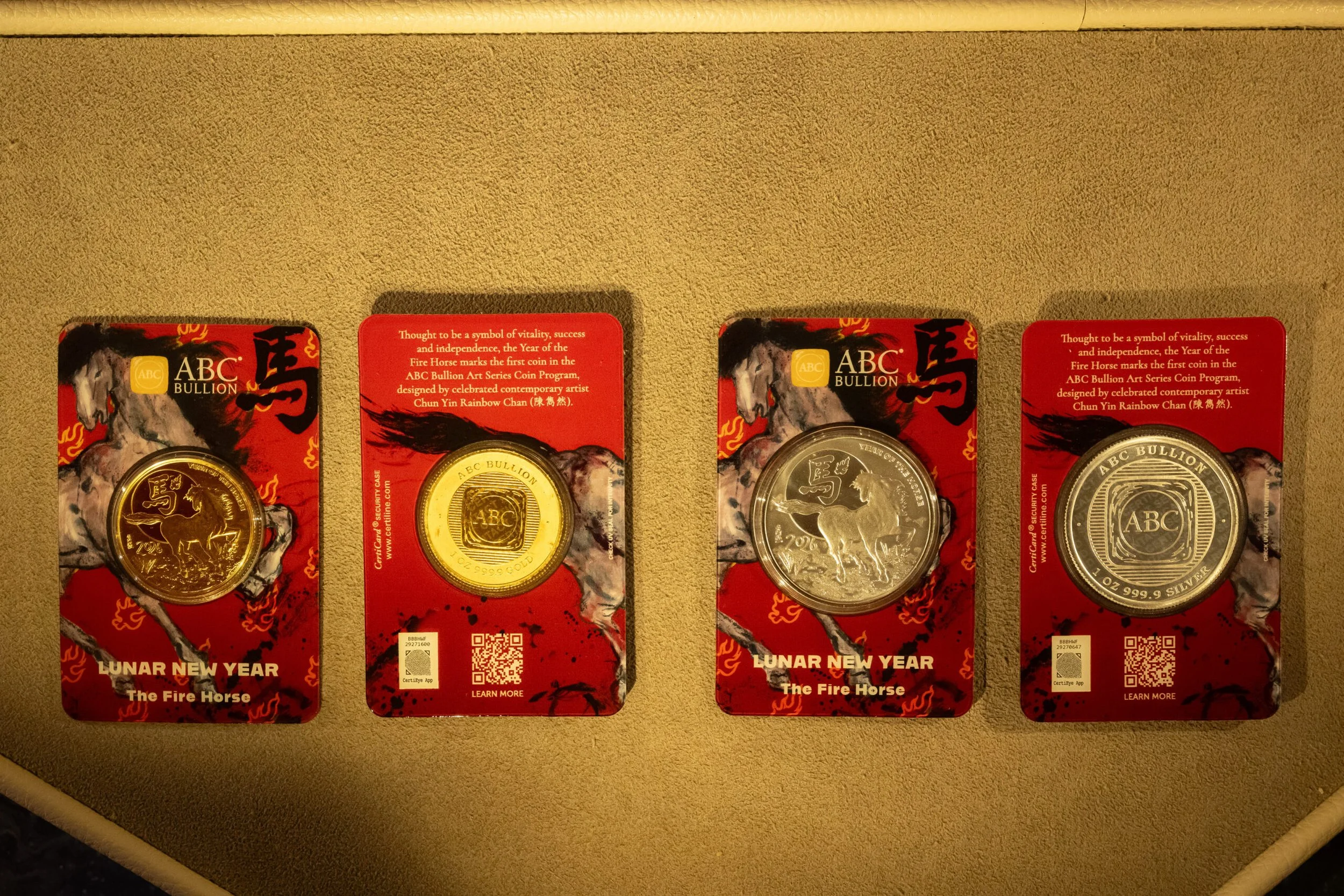 "The Fire Horse" 1 oz gold and silver coins in custom blister packs.