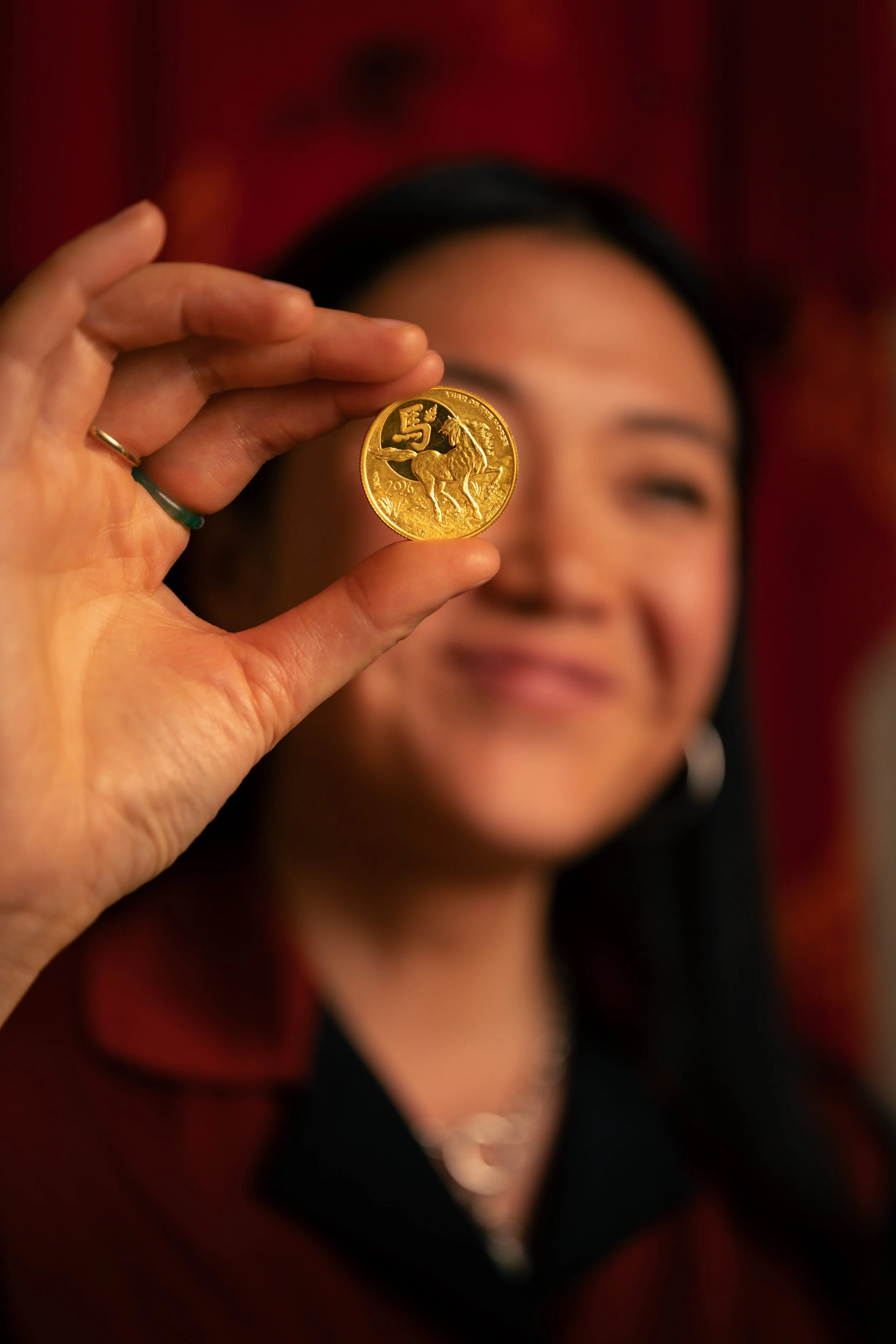 Rainbow Chan with "The Fire Horse" 1 oz gold coin.