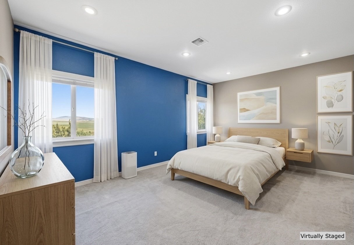 Primary bedroom virtually staged.jpg
