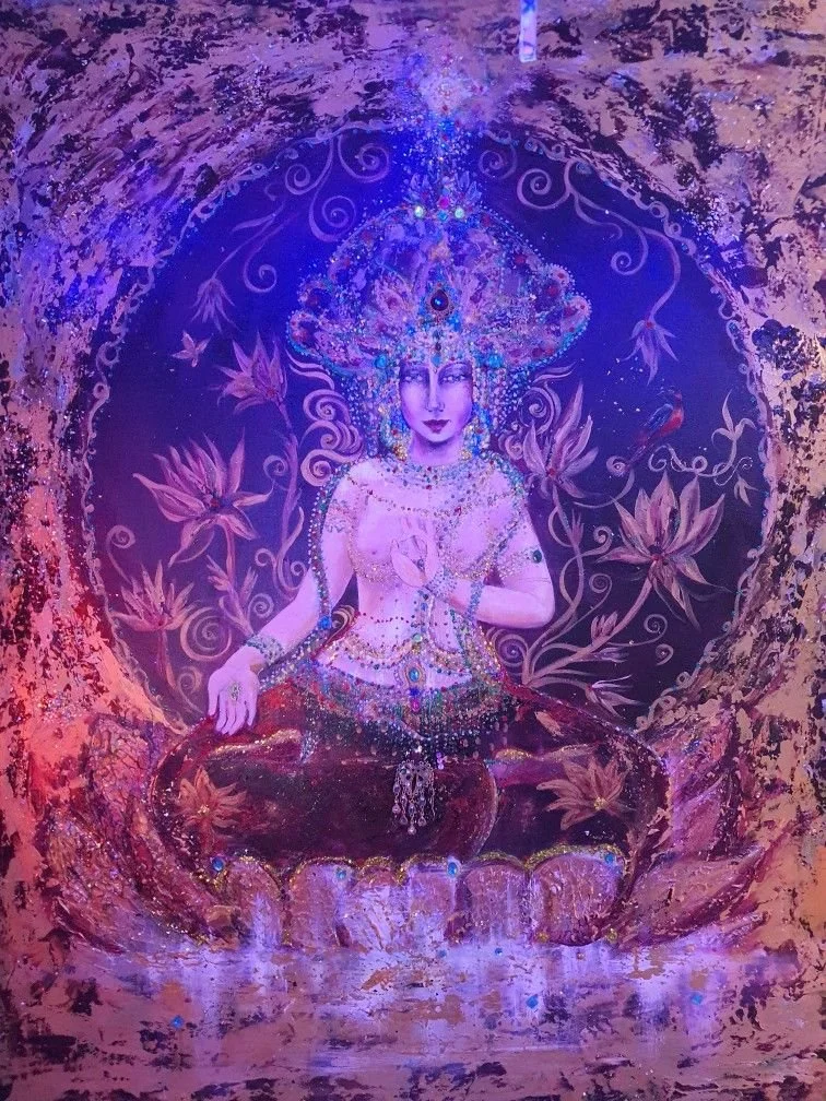 A colorful, artistic depiction of a woman with an elaborate headdress, sitting in a meditative pose, surrounded by floral and swirly patterns with a mystical, spiritual theme.