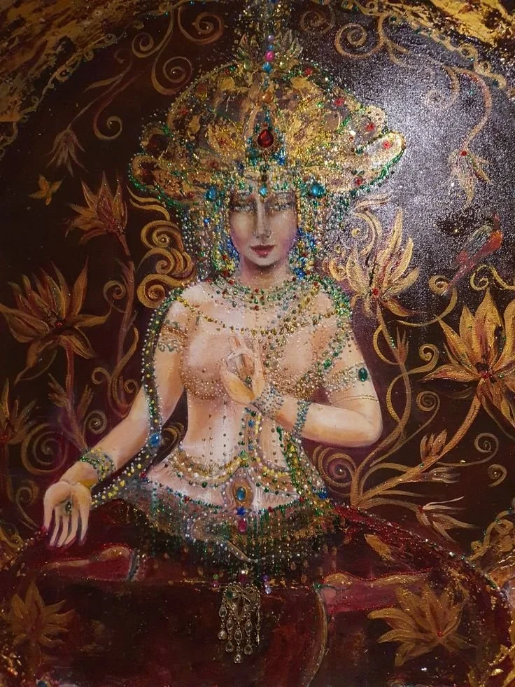 A richly decorated painting of a woman wearing elaborate jewelry and a golden headdress, surrounded by floral motifs and ornate designs.