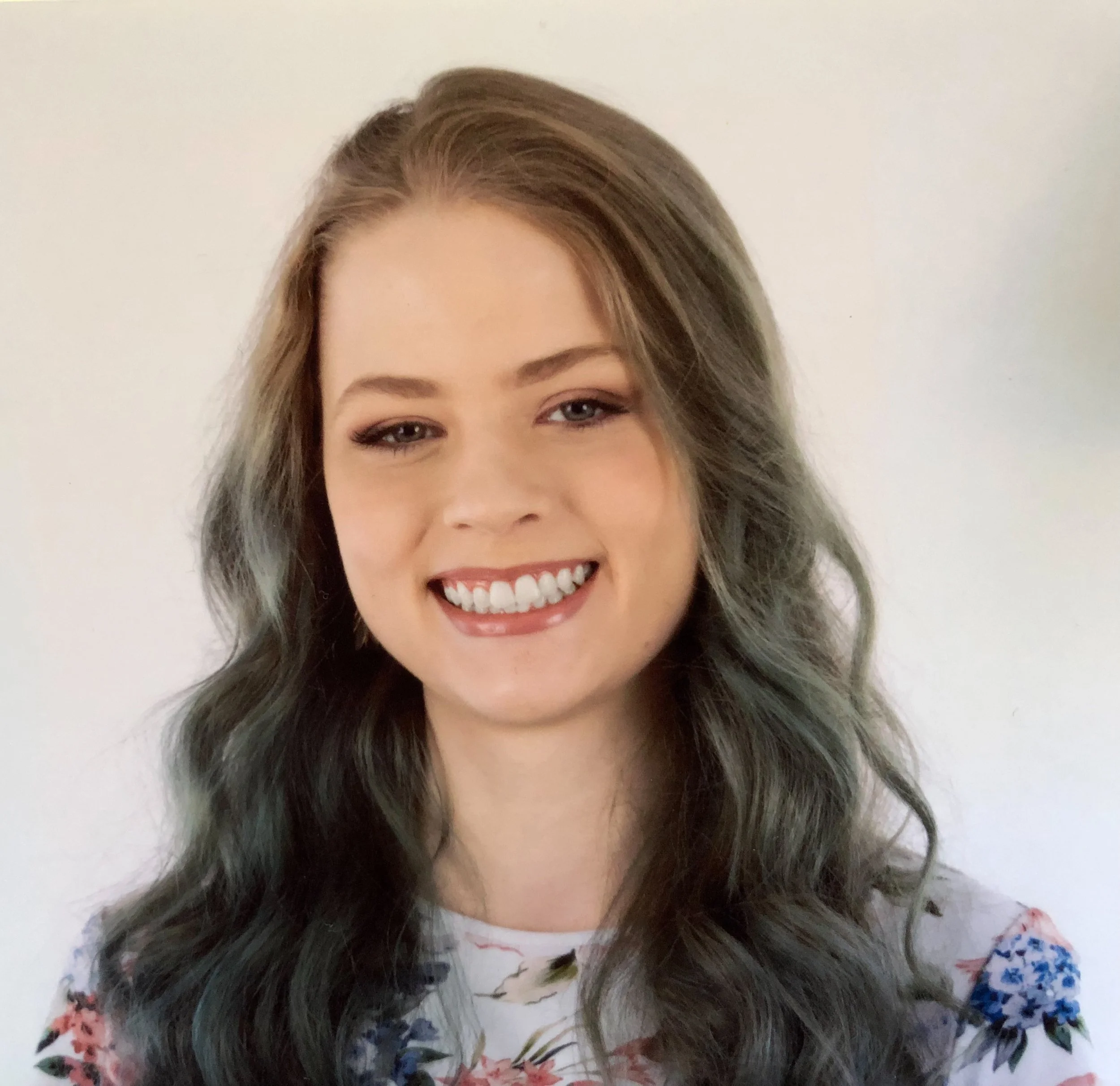 Portrait headshot of graphic designer Sophie Gull.
