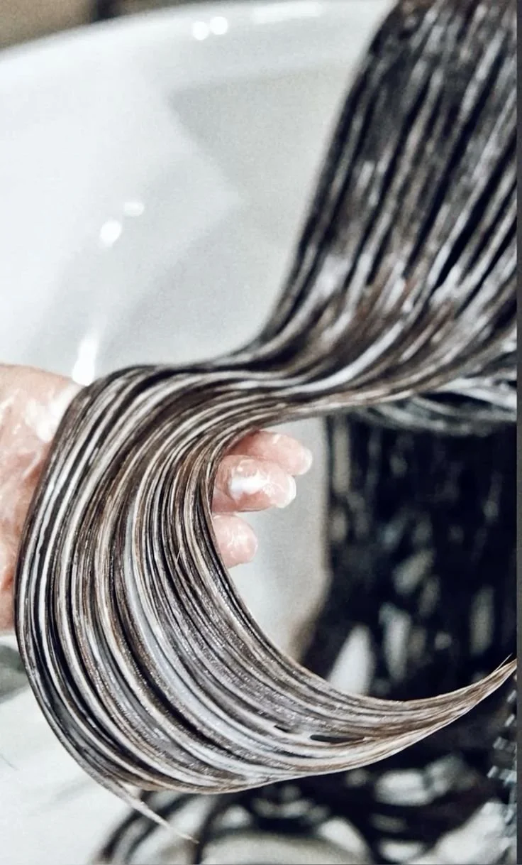 Professional hair repair treatment designed to restore moisture, strength, shine, and long-term hair health.