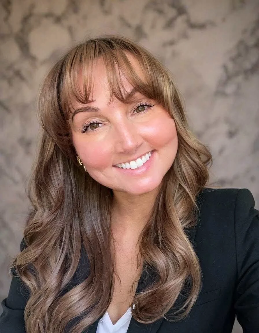 Gina Osborne, hairstylist and owner of Hair by Gina.O in Salem, Virginia.