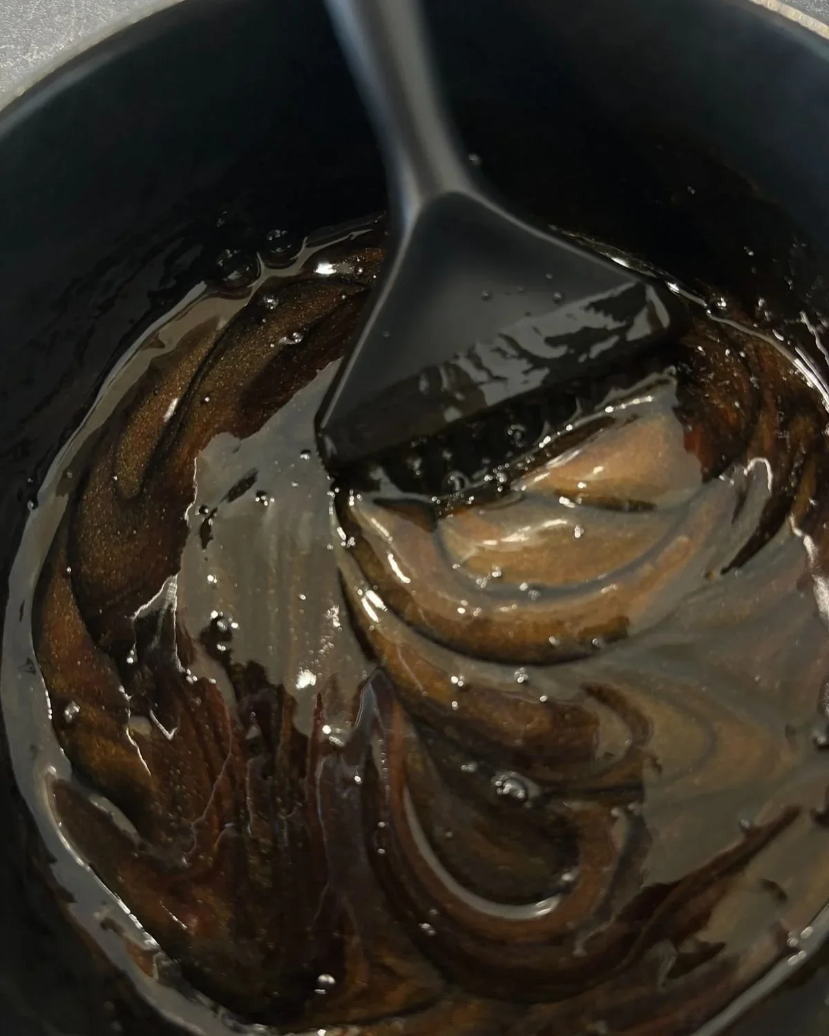 Professional hair color formula being mixed for a custom color service.