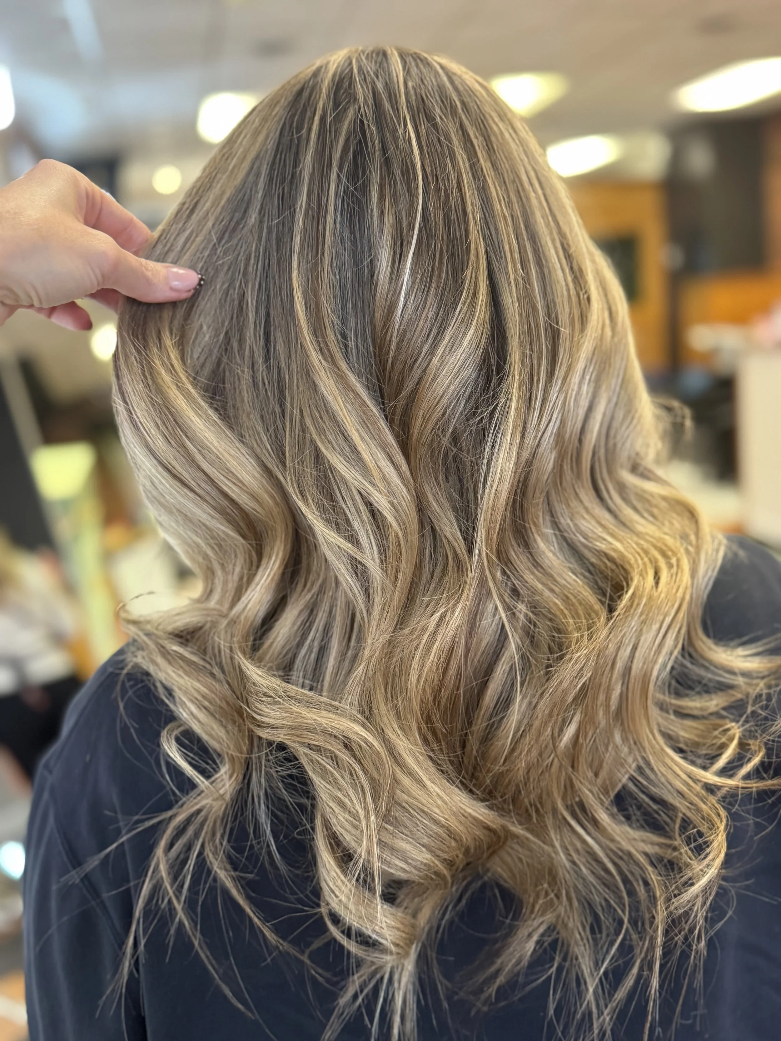 Dimensional blonde highlight and balayage in Salem, VA