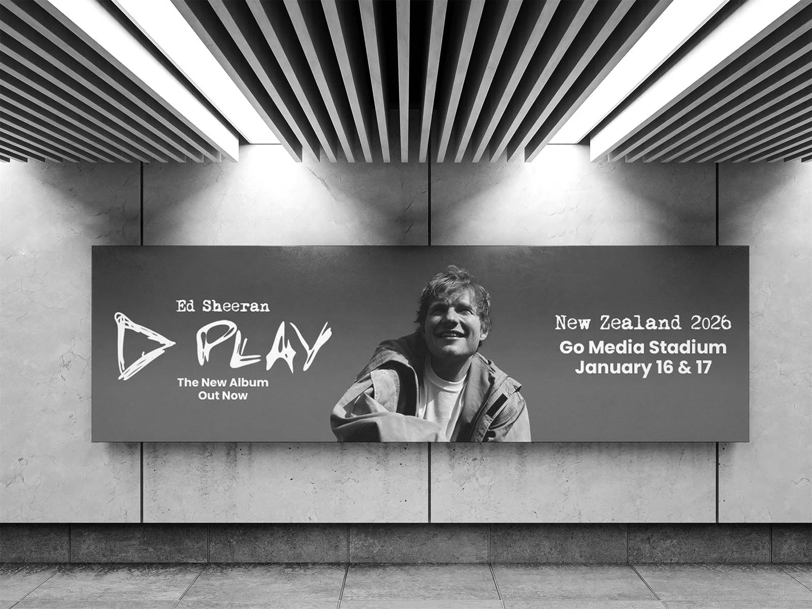 Black and white poster in an indoor setting promoting Ed Sheeran's new album, titled "PLAY," with details about a concert at Go Media Stadium in New Zealand, scheduled for January 16th and 17th, 2026.