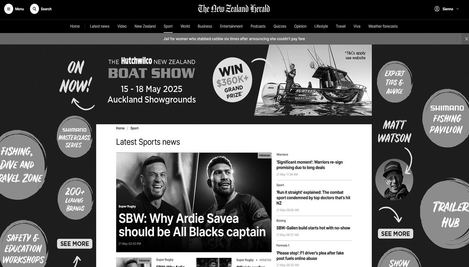 Screenshot of The New Zealand Herald website with a black and white theme, showing sports news including a headline about Ardian Savea and rugby players, along with various circular advertisements and sections for sports events and tips.