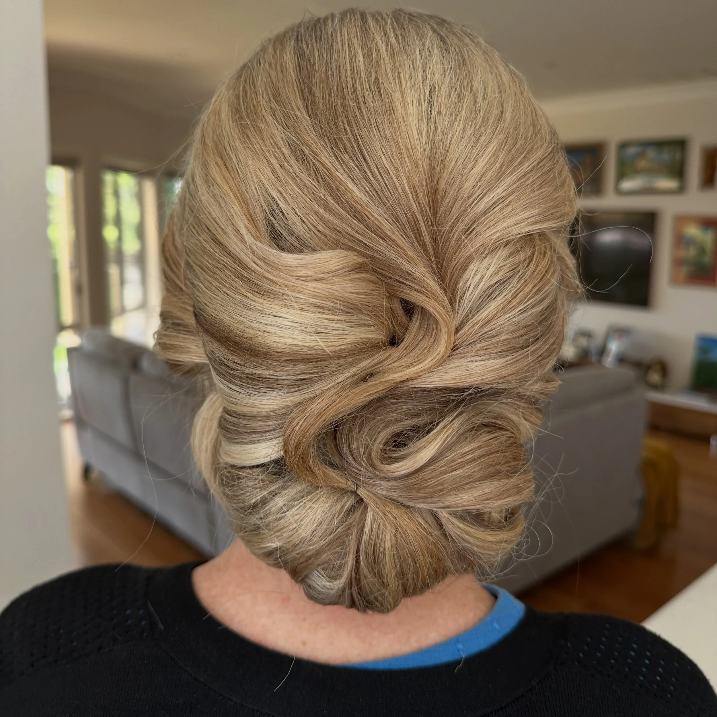Classic elegance with a modern touch! A beautifully textured low bun featuring soft twists, volume, and a polished finish🤍🤍 

#updo #updohairstyles #hairup #gradhair #weddinghair