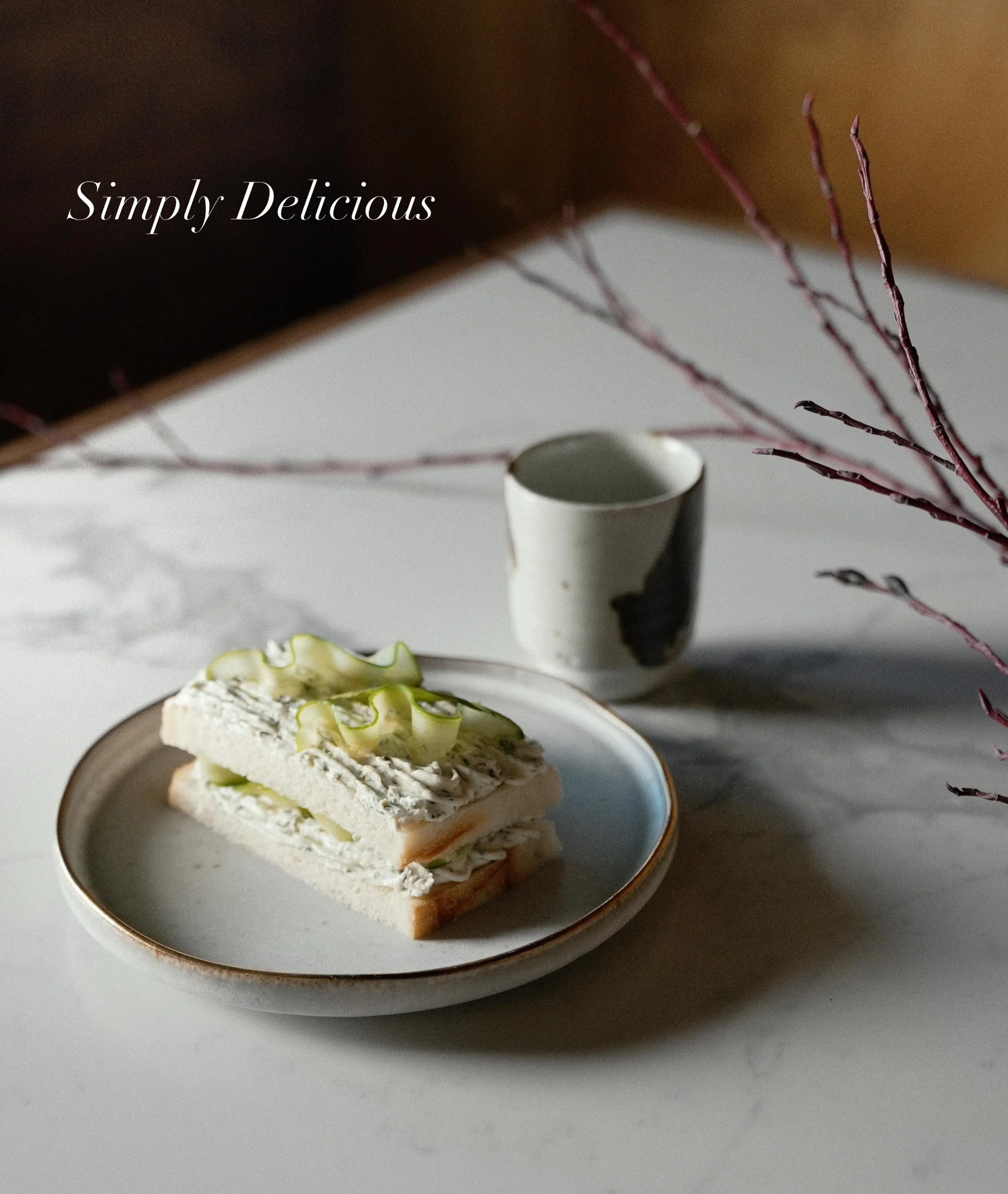 Fresh cucumber layered with cucumber and rauram cream, cucumber gel, and soft shokupan  #nudiblueberkeley #CucumberSandwich #simplydelicious #TeaAndSandwiches