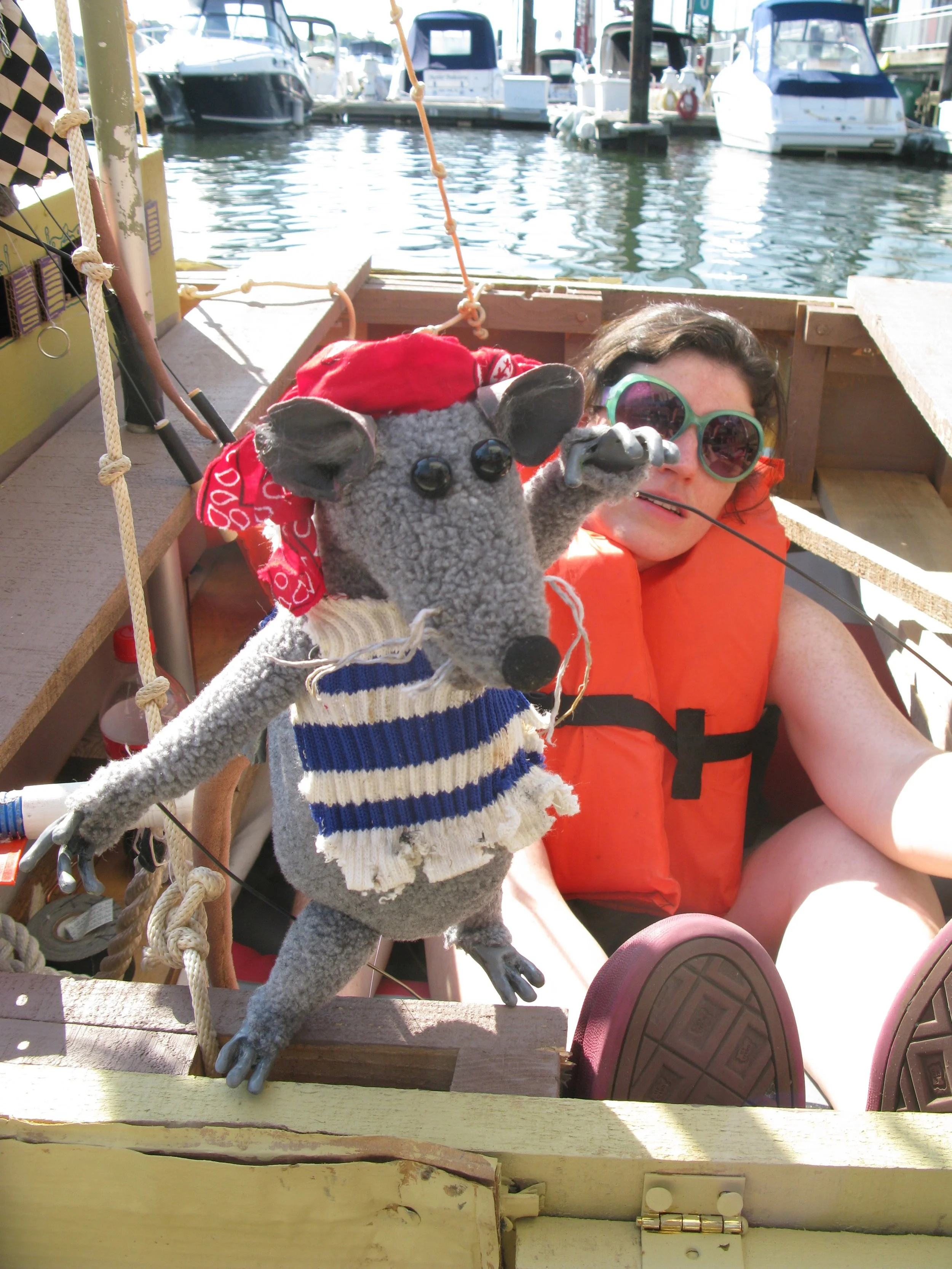 Anney puppeteers Pirate Rat Puppet in boat on Hudson River