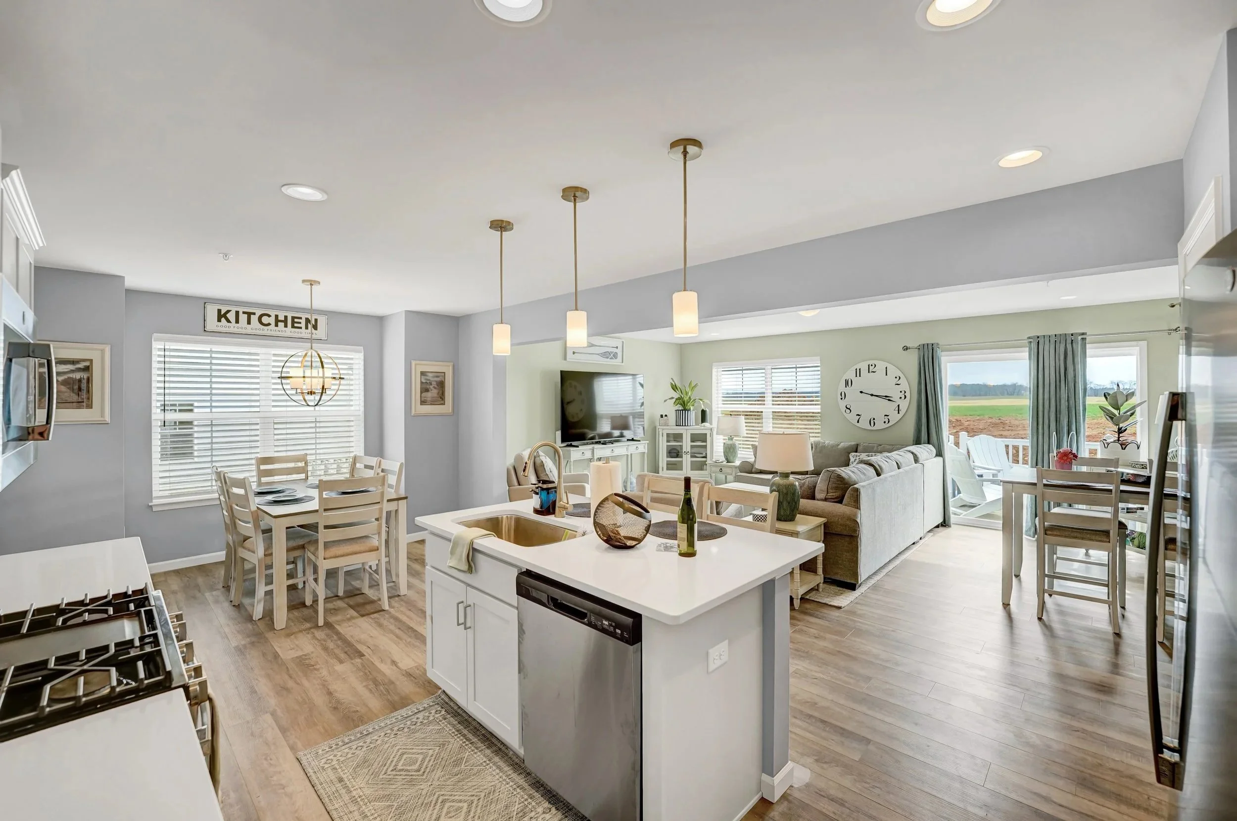 Allen Street's Kitchen with beach tones leading into the great living area.