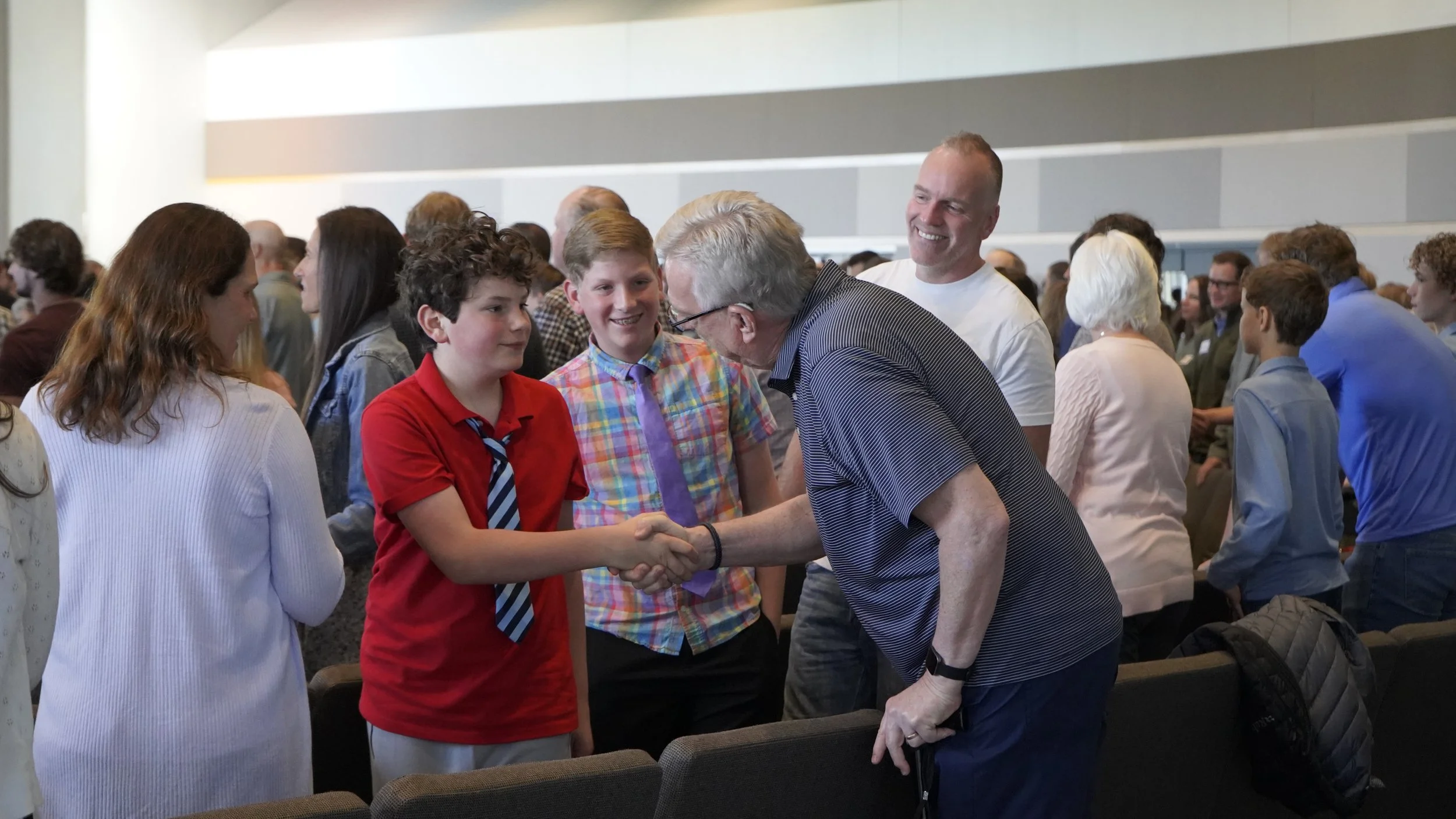 Congregation Interacts With Each Other During The "Turn And Greet" moment during service.