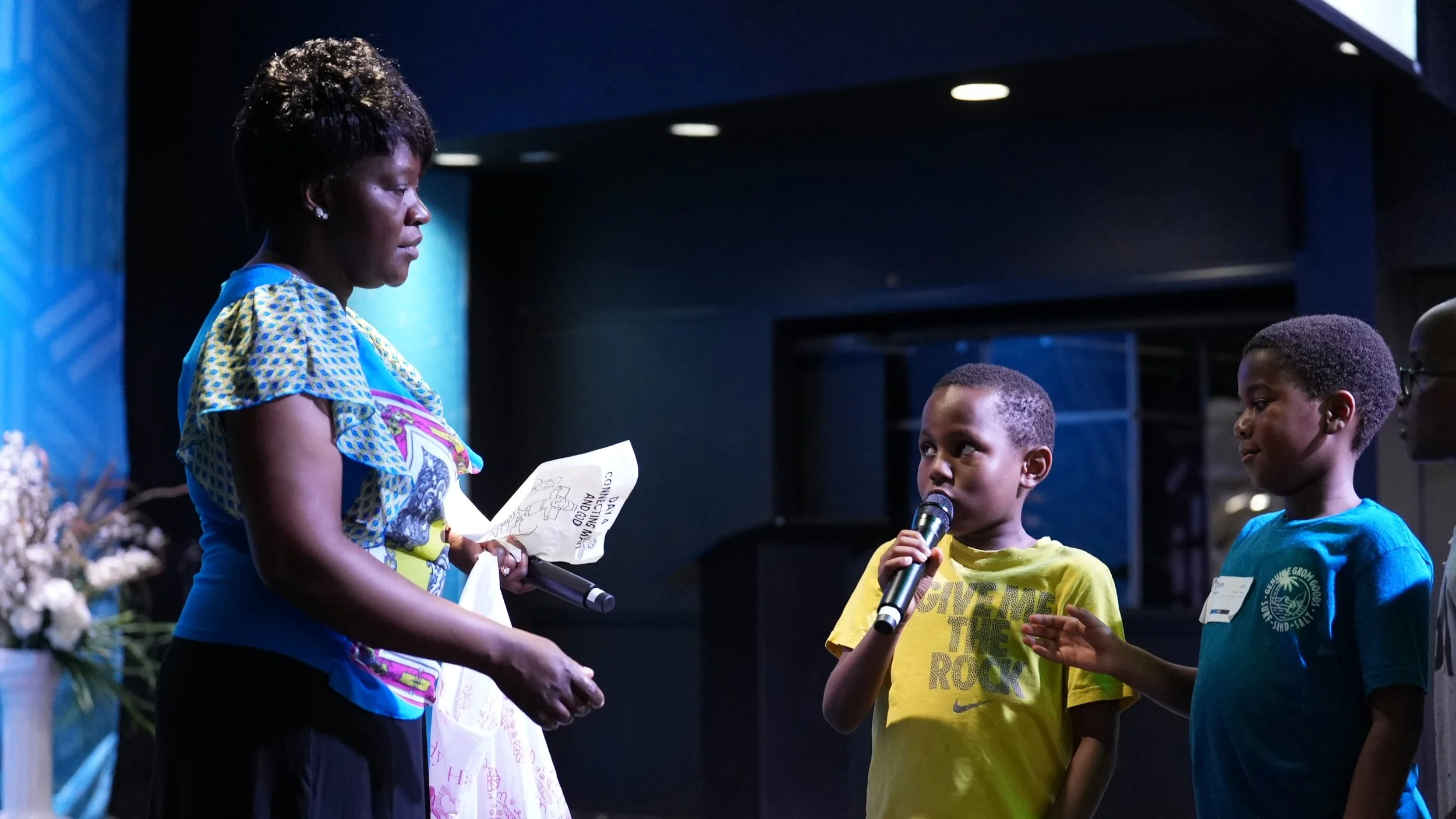 A kid reciting a Bible Verse during All Nations Breakthrough Church's Vacation Bible School
