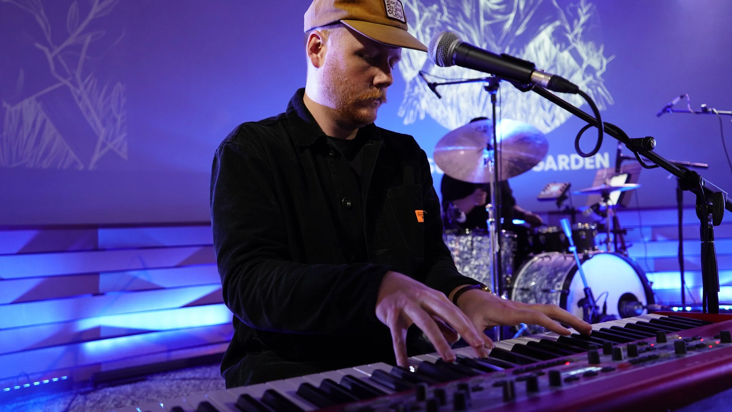 A Member of Poor Bishop Hooper Plays Keyboard