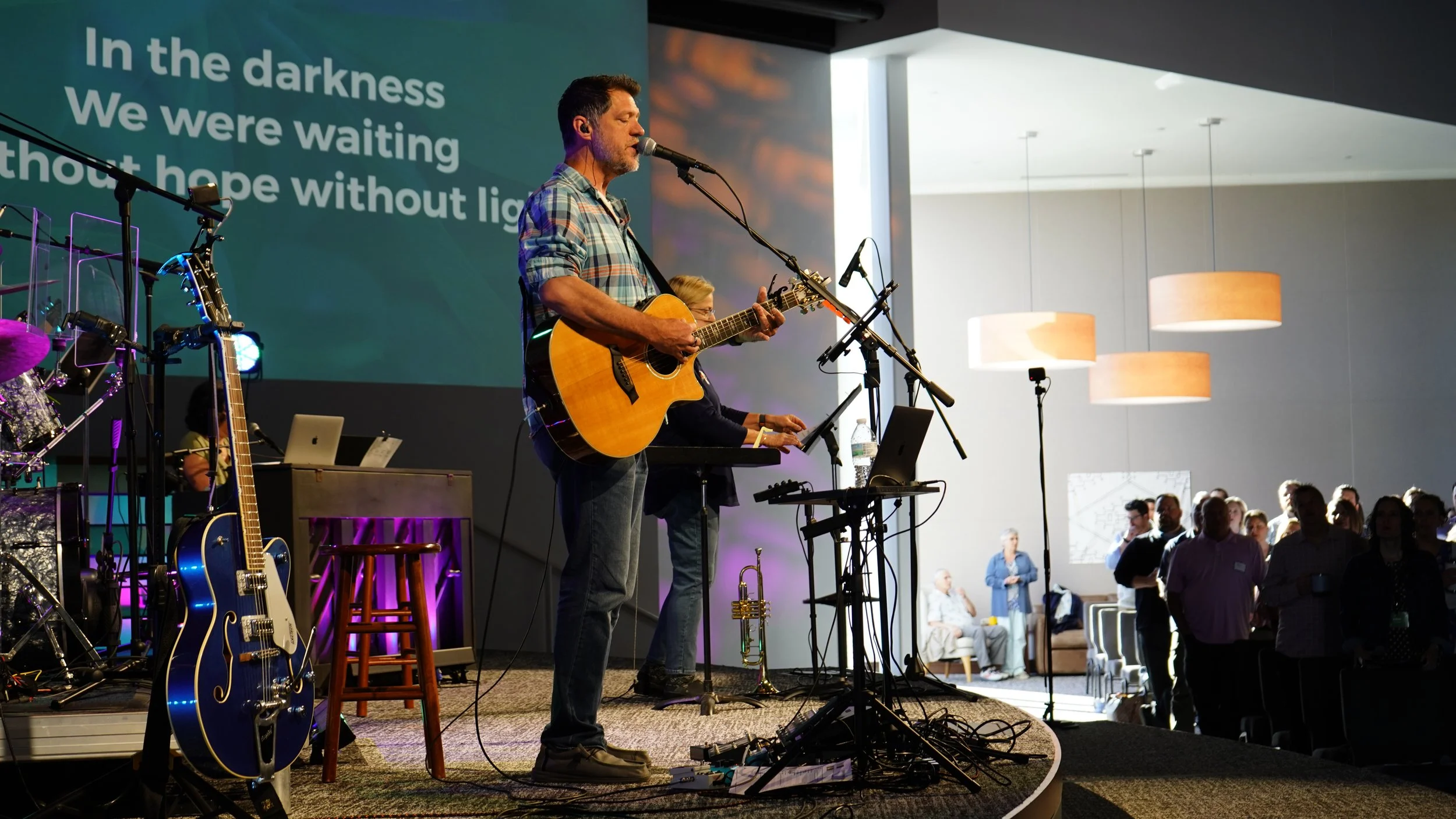 Worship Leader Leads Worship At Christ Community Church 