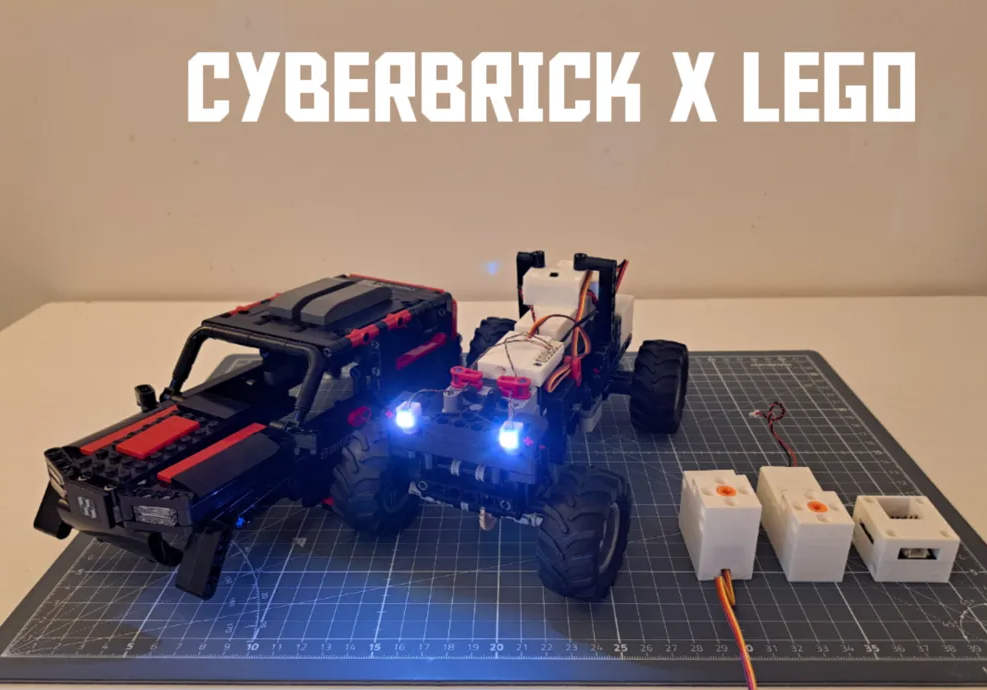 A LEGO and Cyberbrick themed robot model built with LEGO and Cyberbrick components, placed on a cutting mat, with wires and batteries nearby, and the text 'CYBERBRICK X LEGO' above.