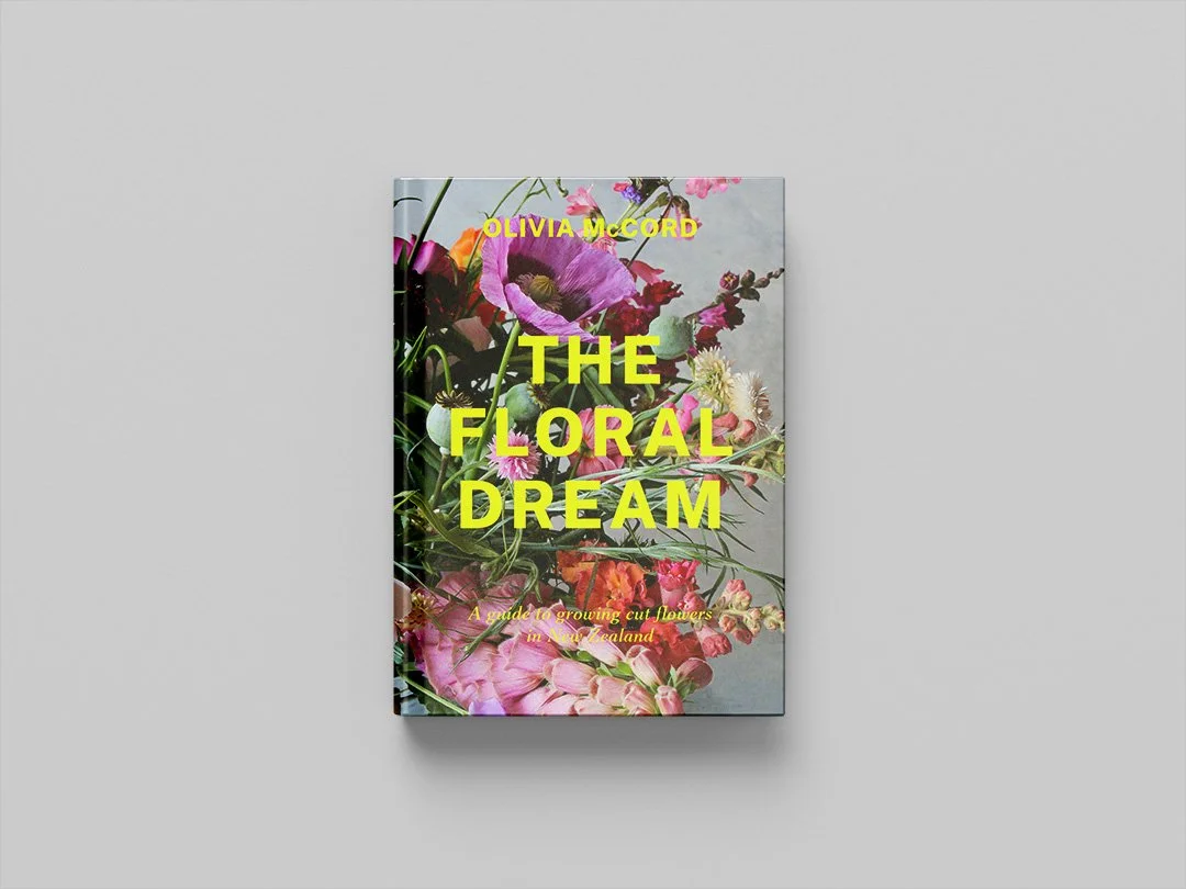 Book titled "The Floral Dream" featuring a cover with various colorful flowers on a gray background.