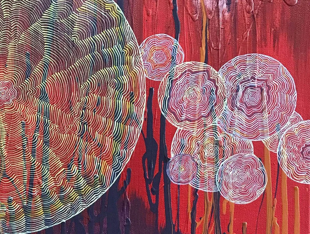 Abstract painting by Tanja Ackerman featuring concentric circular line patterns on a textured red background with vertical drips, blending multicoloured rings and fine white linework inspired by synaesthetic perception.