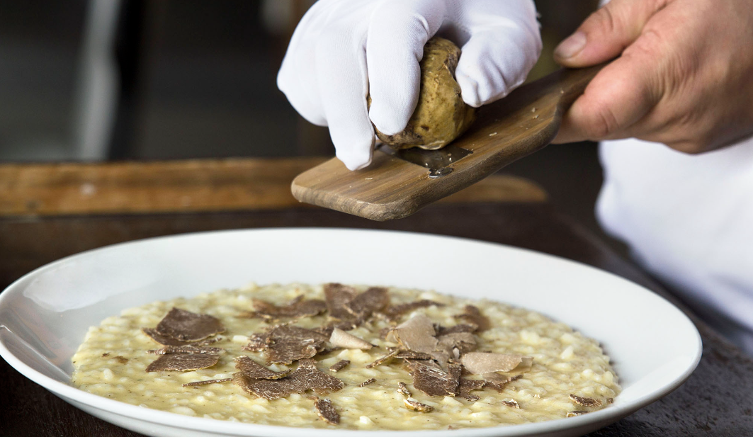 Truffle risotto Hong Kong – chef shaving fresh truffle at GIA
