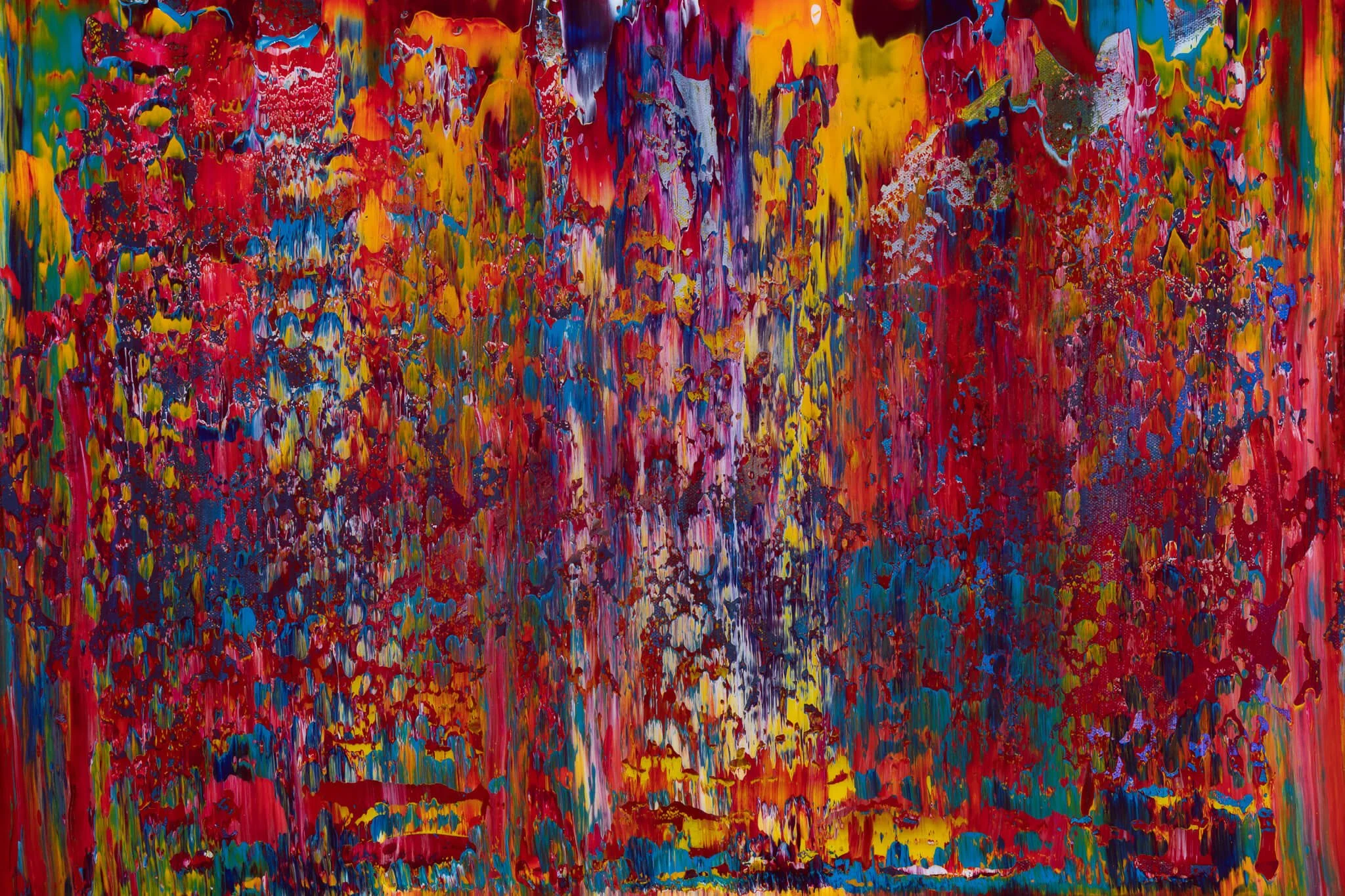 Abstract expressionist painting with vibrant splashes of red, yellow, blue, green, and purple colors.