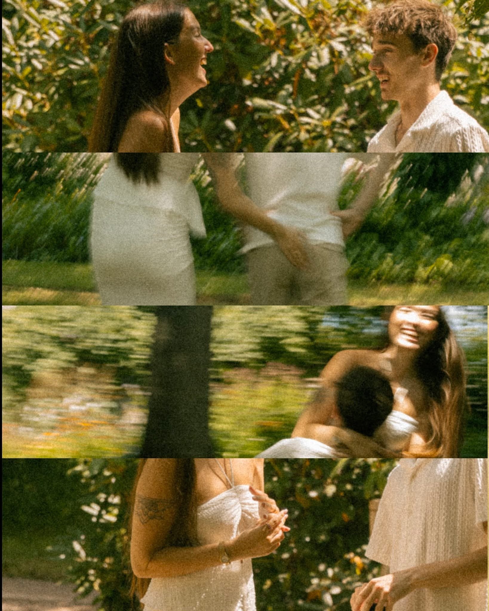 Four people are outdoors in a garden or park, smiling and talking to each other. They are dressed casually, with women in white dresses and a man in a white shirt.