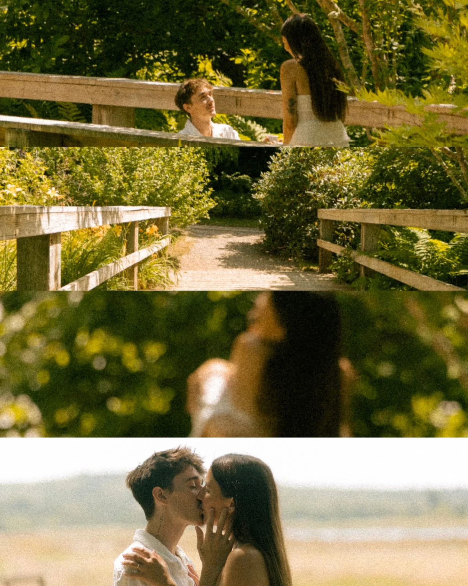 A couple is walking along a wooded path, having an affectionate moment with a kiss at the end.