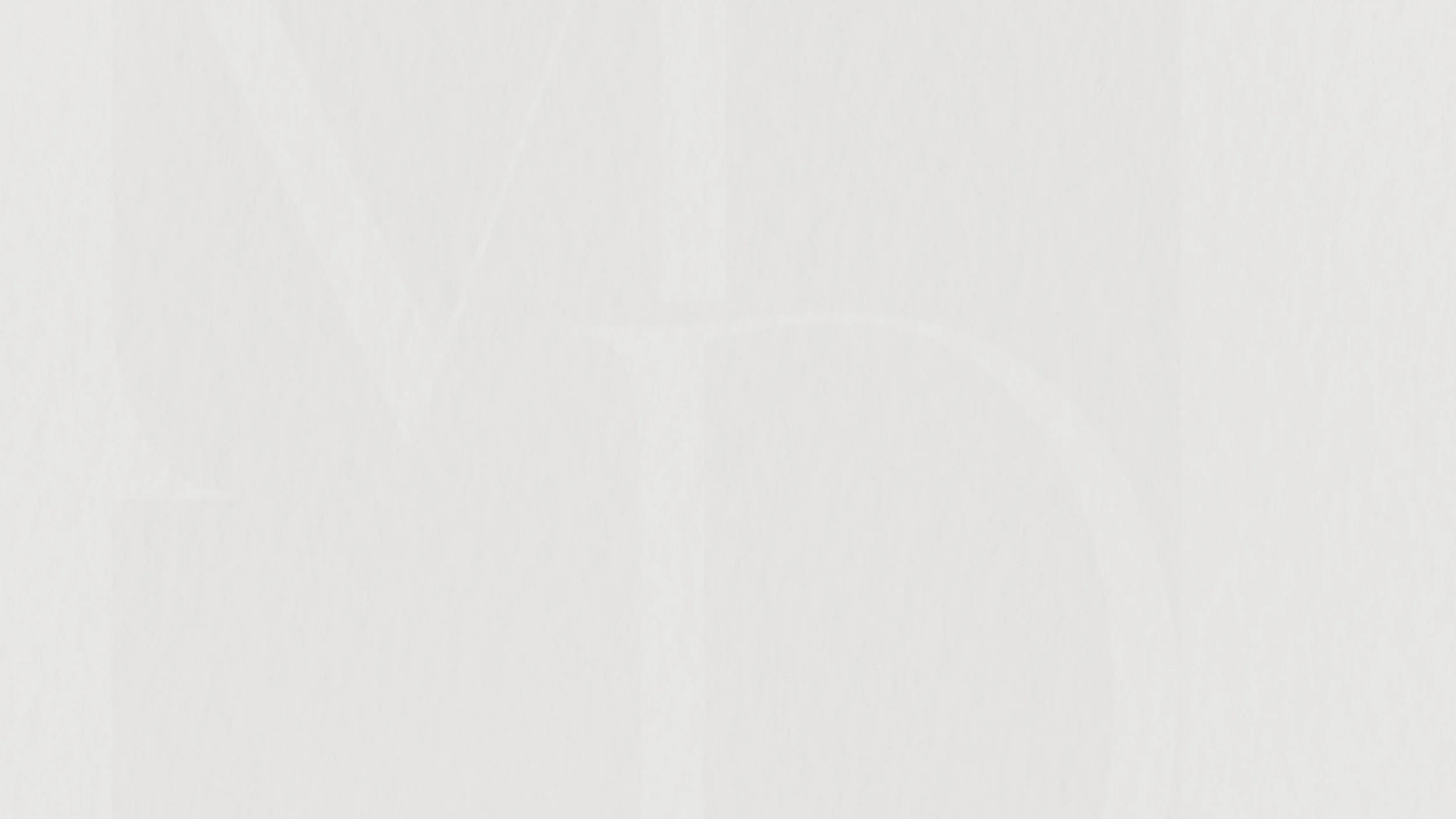 Empty white sheet of paper with no visible objects or text.