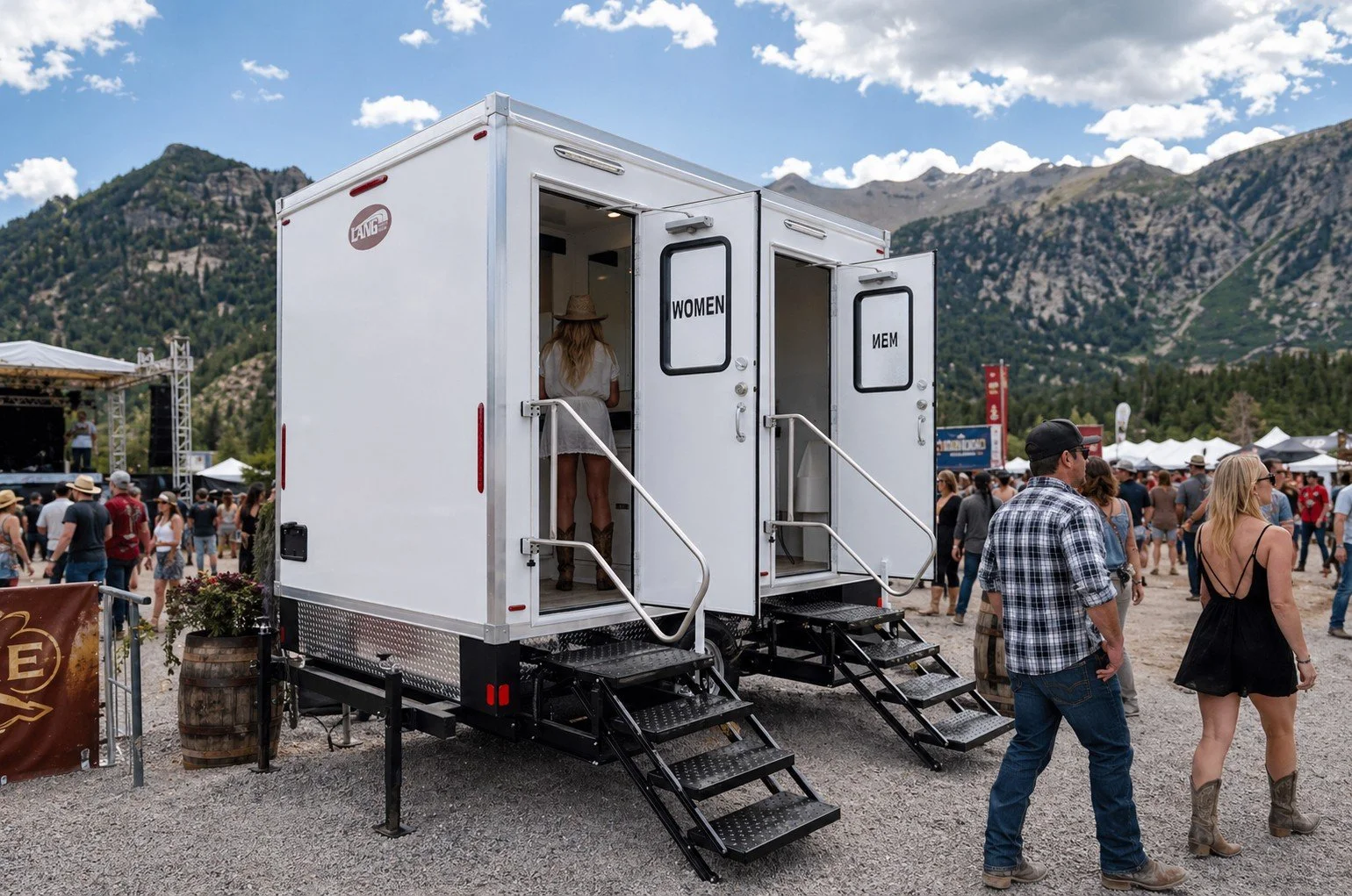 Luxury restroom trailer at a busy outdoor event in Colorado