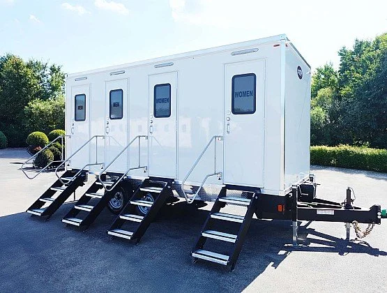 Altitude Restroom Suites 4-station luxury restroom trailer available for weddings, corporate events, and festivals throughout Colorado.