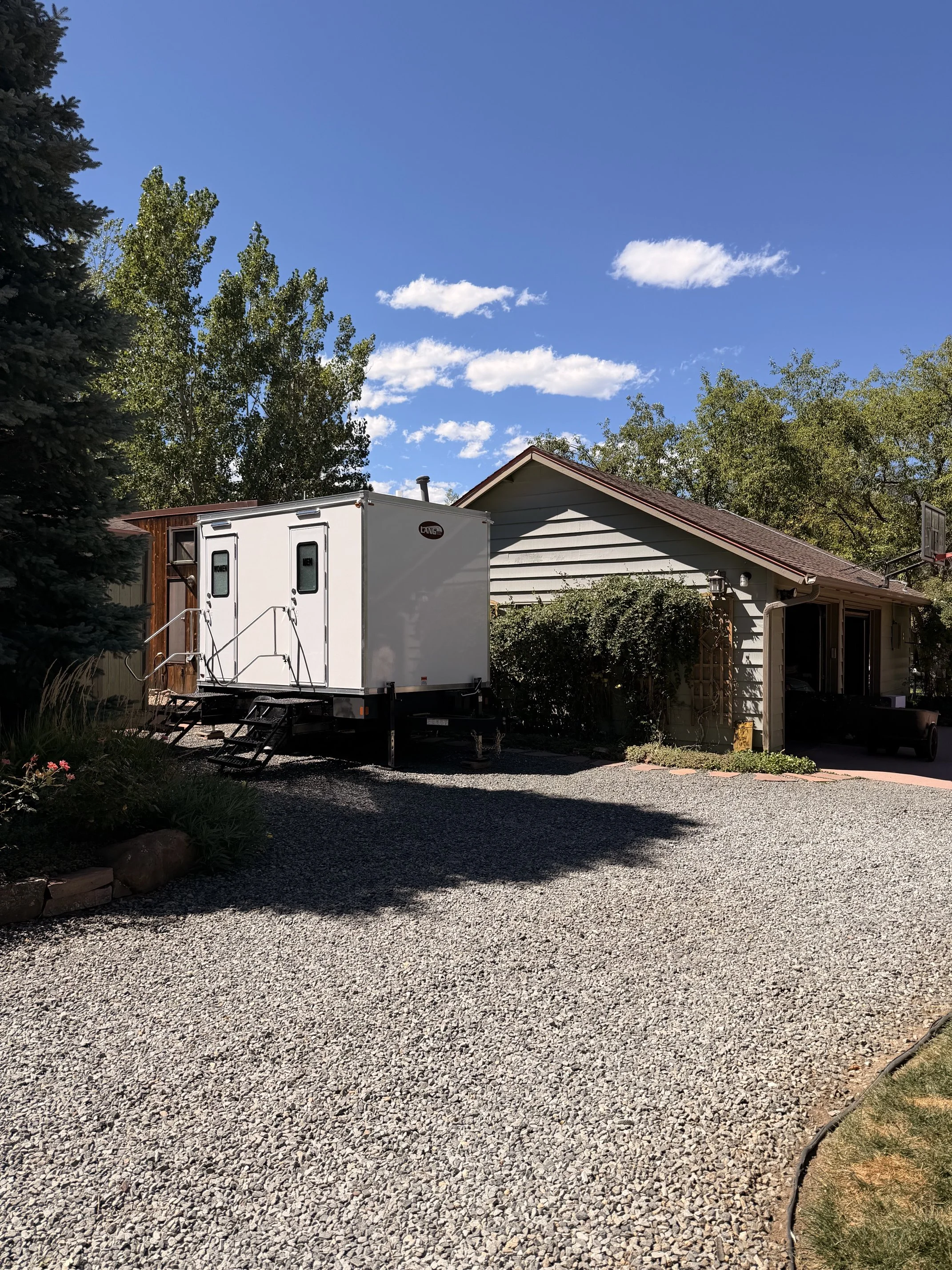Altitude Restroom Suites luxury restroom trailer set up for a private-property wedding in Boulder, Colorado.