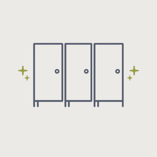 Private restroom stalls inside a luxury restroom trailer