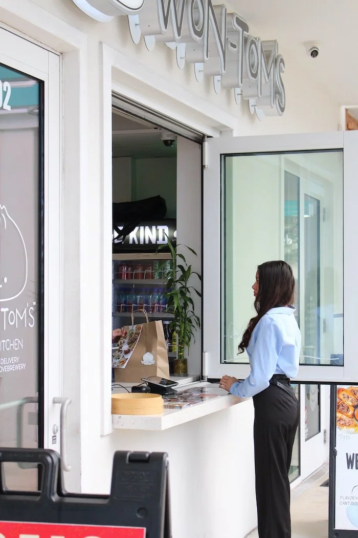won-toms-woman-ordering-food.JPG